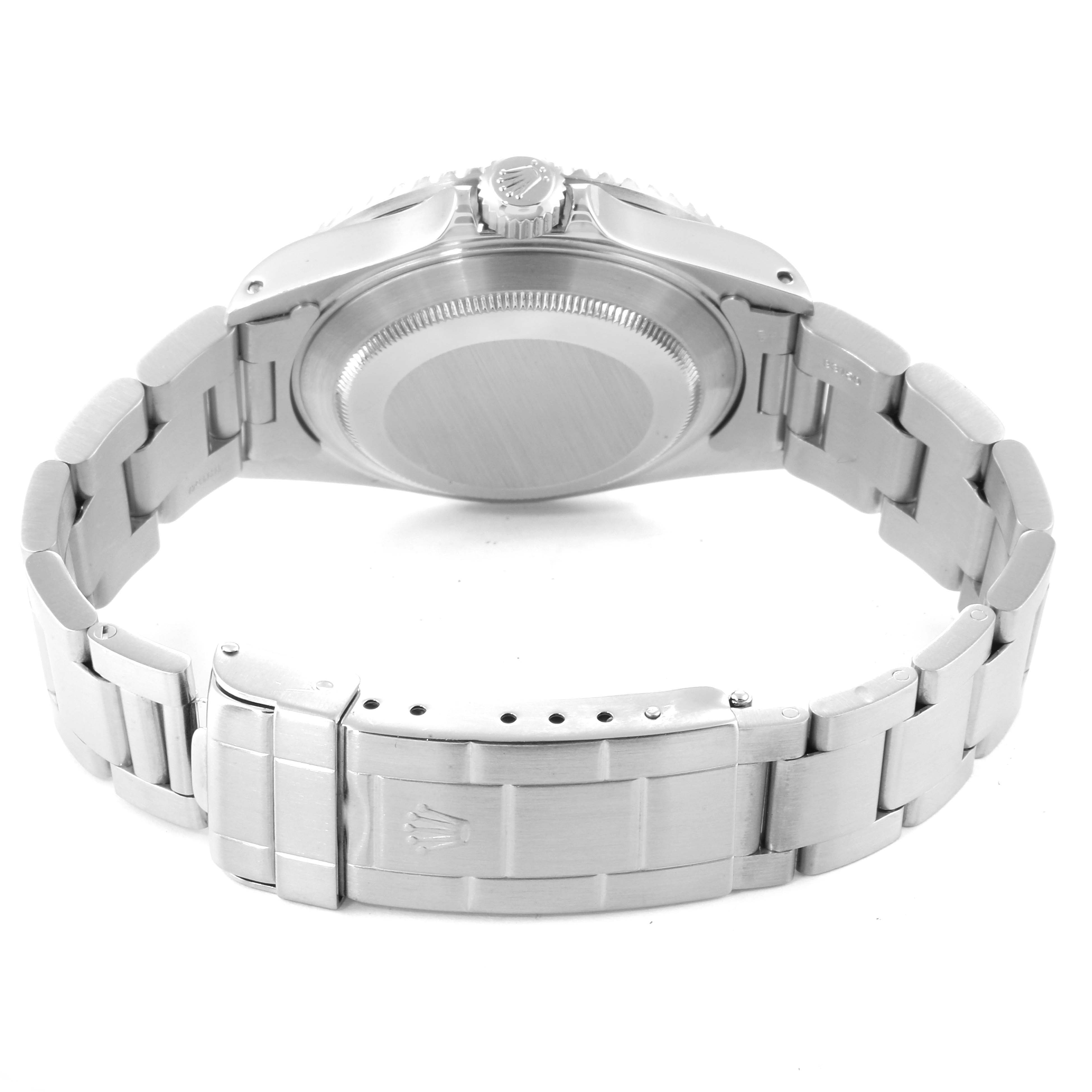 The image shows the backside of the Rolex Submariner 16610 Men
s Stainless Steel Black Dial 16610 Men
s Stainless Steel Black Dial watch, highlighting the case back, crown, and bracelet with clasp.