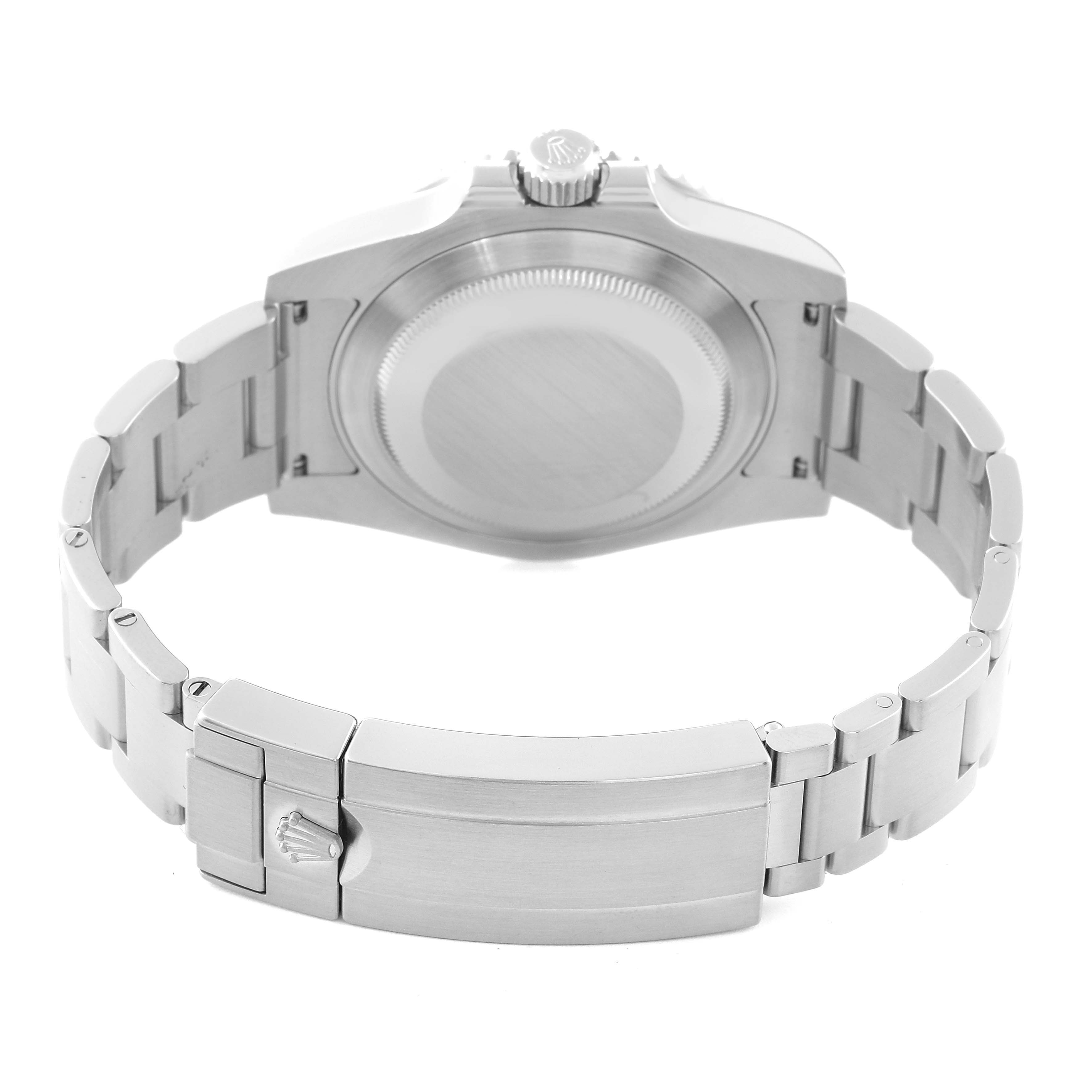 The image shows the back view of a Rolex Submariner 116610LV Men
s Stainless Steel Green Dial 116610LV Men
s Stainless Steel Green Dial watch, highlighting the case back and bracelet clasp.