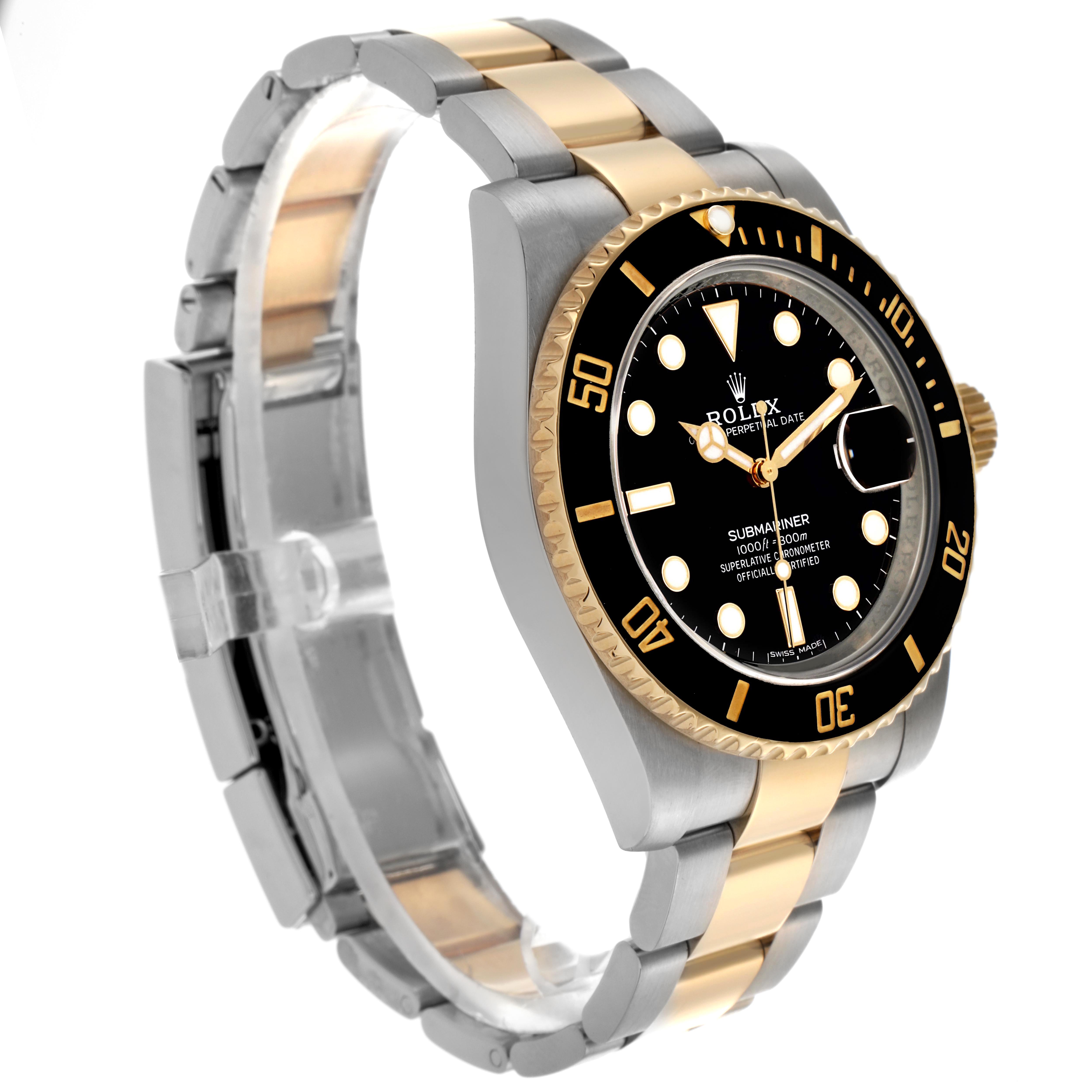 The Rolex Submariner 116613 Men's Steel and Gold (two tone) Black Dial 116613 Men's Steel and Gold (two tone) Black Dial is shown at an angle displaying the dial, bezel, and bracelet, highlighting its gold and silver tones.