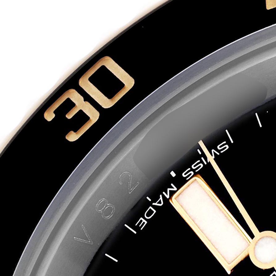 The image shows a close-up of the bezel and dial edge of a Rolex Submariner 116613 Men's Steel and Gold (two tone) Black Dial 116613 Men's Steel and Gold (two tone) Black Dial watch, highlighting the "30" marker and "Swiss Made."