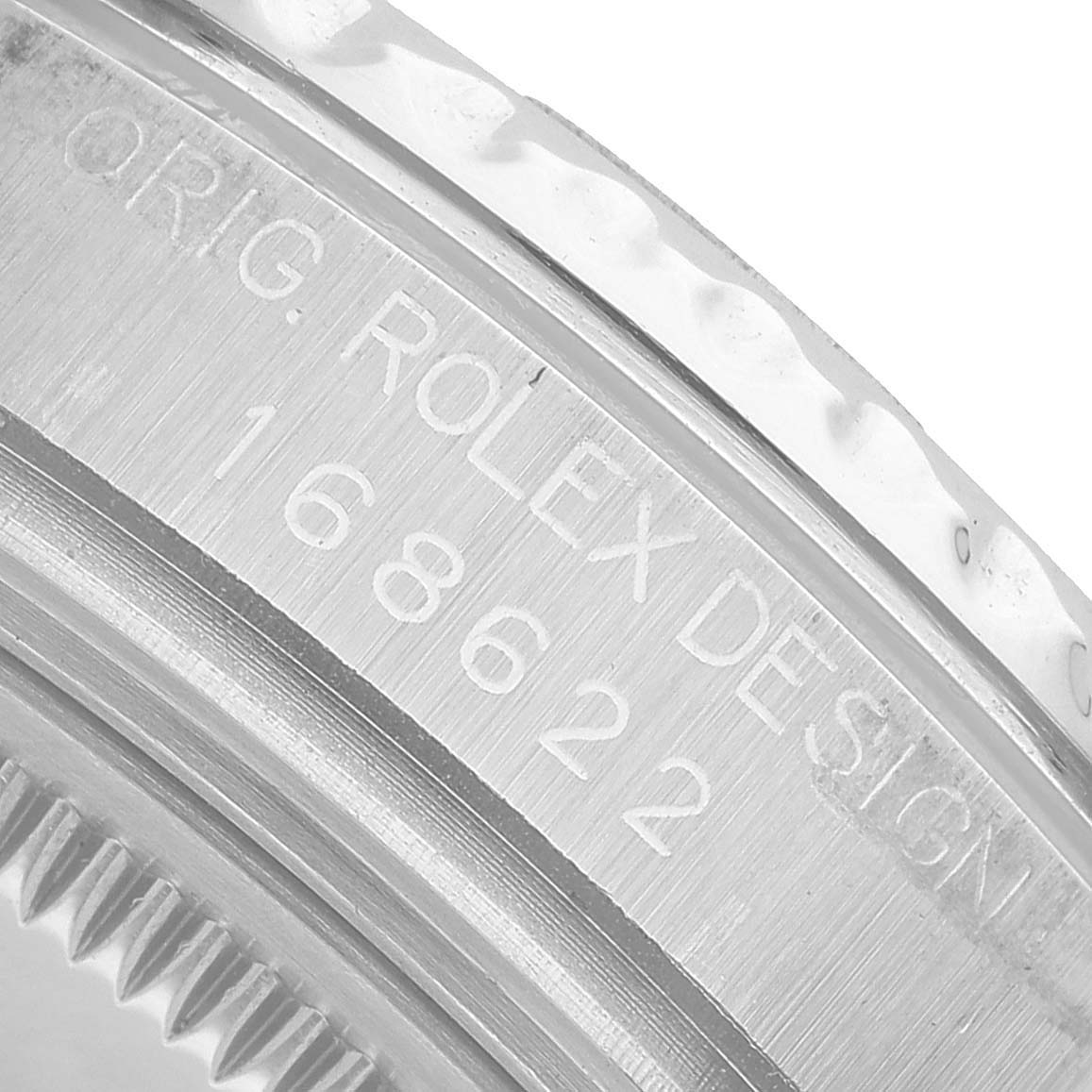 The image shows the edge of a Rolex Yacht-Master 168622 Women's Stainless Steel Silver Dial case with the model number 168622 engraved on the side.