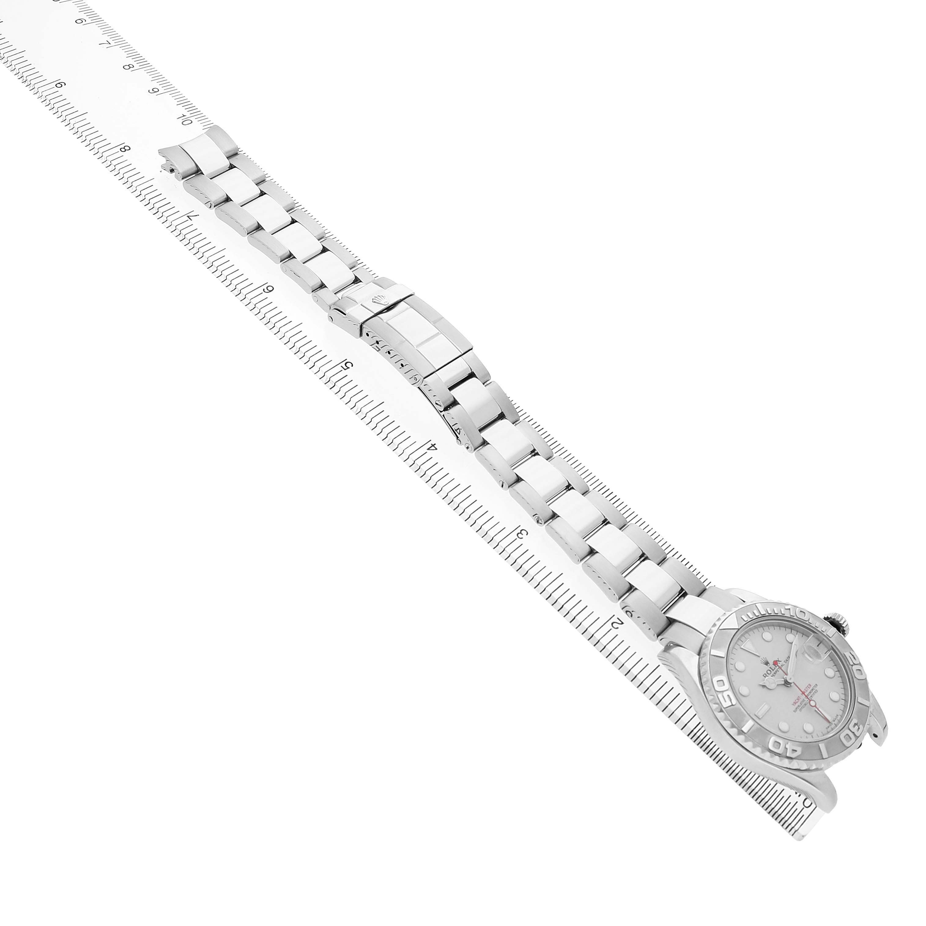 The Rolex Yacht-Master 168622 Women's Stainless Steel Silver Dial watch is shown from a top view, featuring its full bracelet, clasp, and bezel.