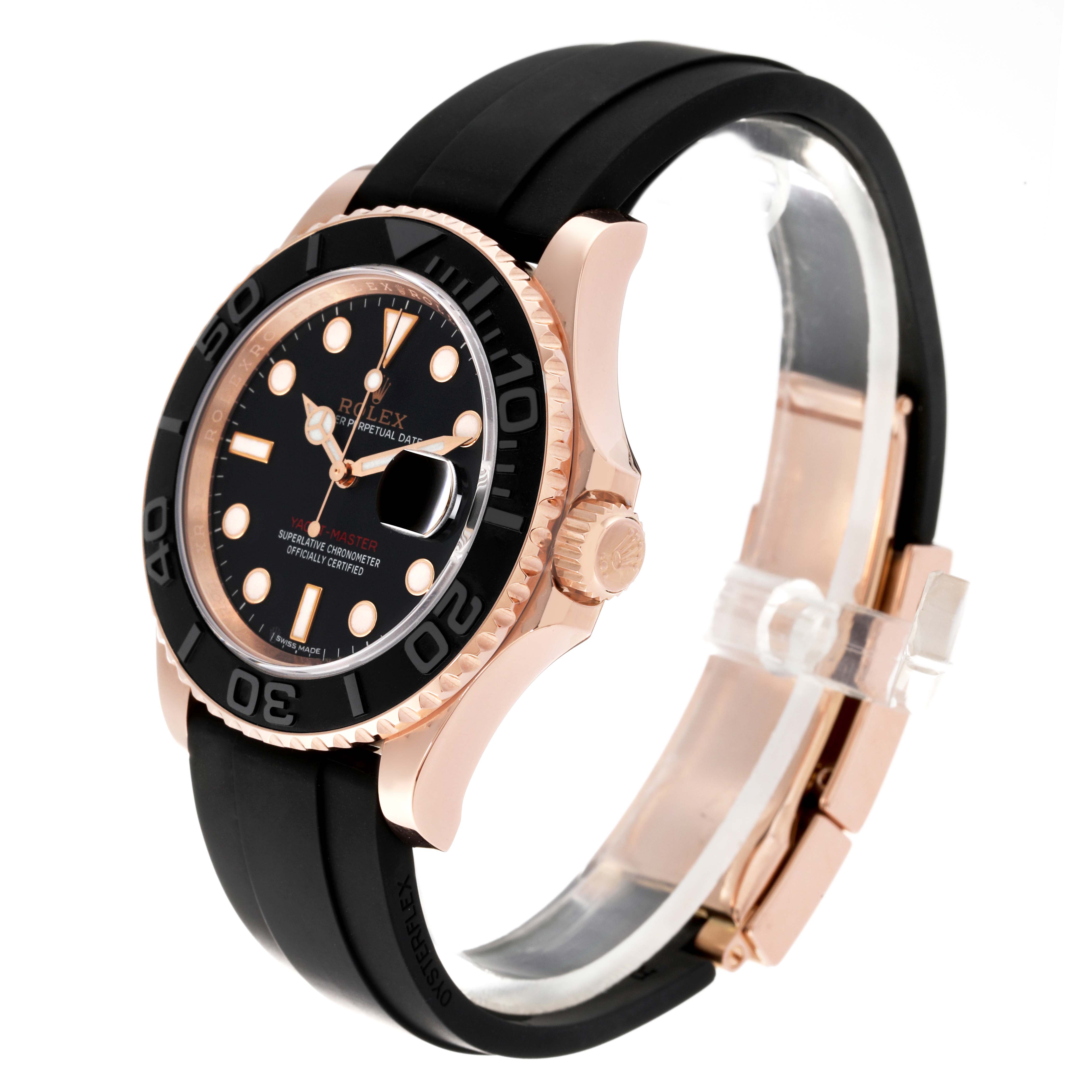 The Rolex Yacht-Master 116655 Men's Rose Gold Black Dial 116655 Men's Rose Gold Black Dial watch is shown at an angle, highlighting its face, bezel, crown, and black rubber strap.