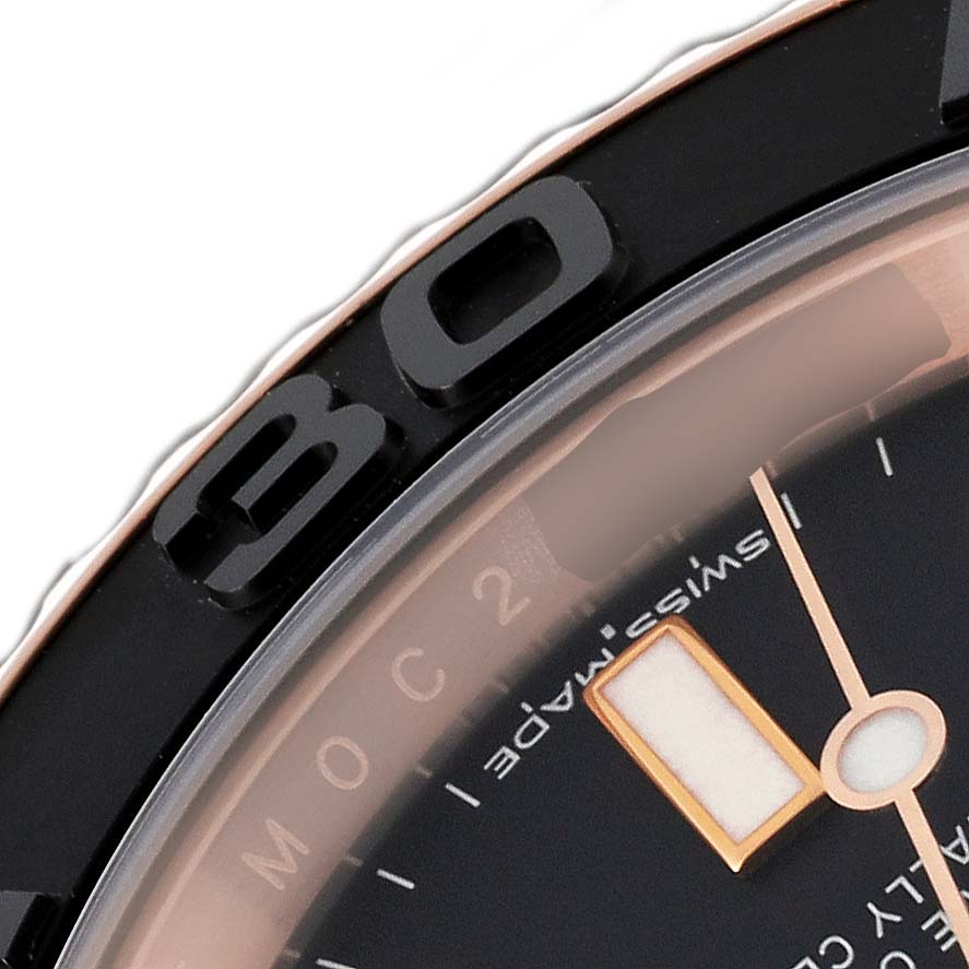 The image shows a close-up angle of the Rolex Yacht-Master 116655 Men's Rose Gold Black Dial 116655 Men's Rose Gold Black Dial watch, focusing on the bezel and part of the dial with the minute hand.