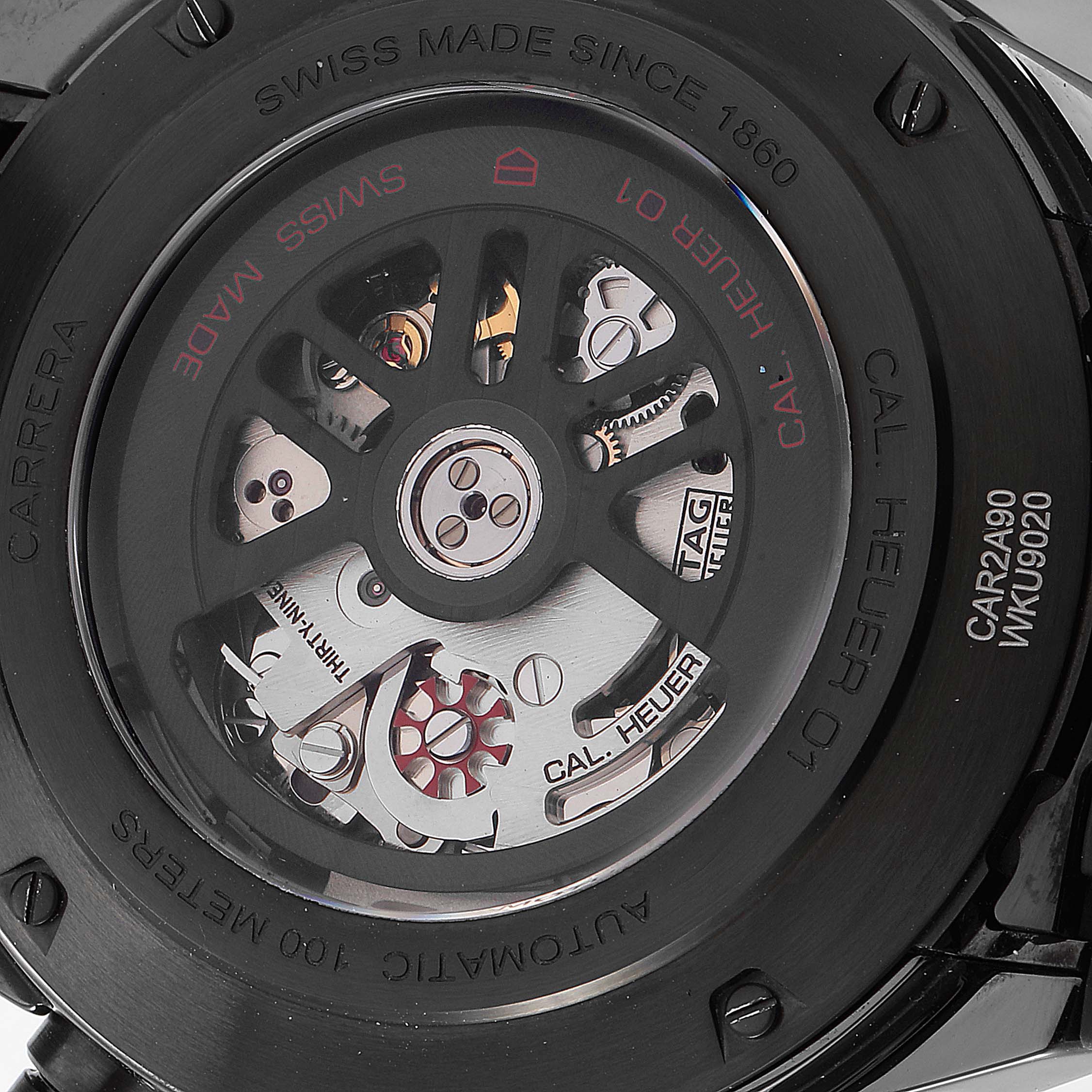 The image shows the back of the Tag Heuer Carrera CAR2A90.FT6071 Men
s Stainless Steel Black Dial CAR2A90.FT6071 Men
s Stainless Steel Black Dial Calibre Heuer 01 watch, displaying its intricate mechanical movement.
