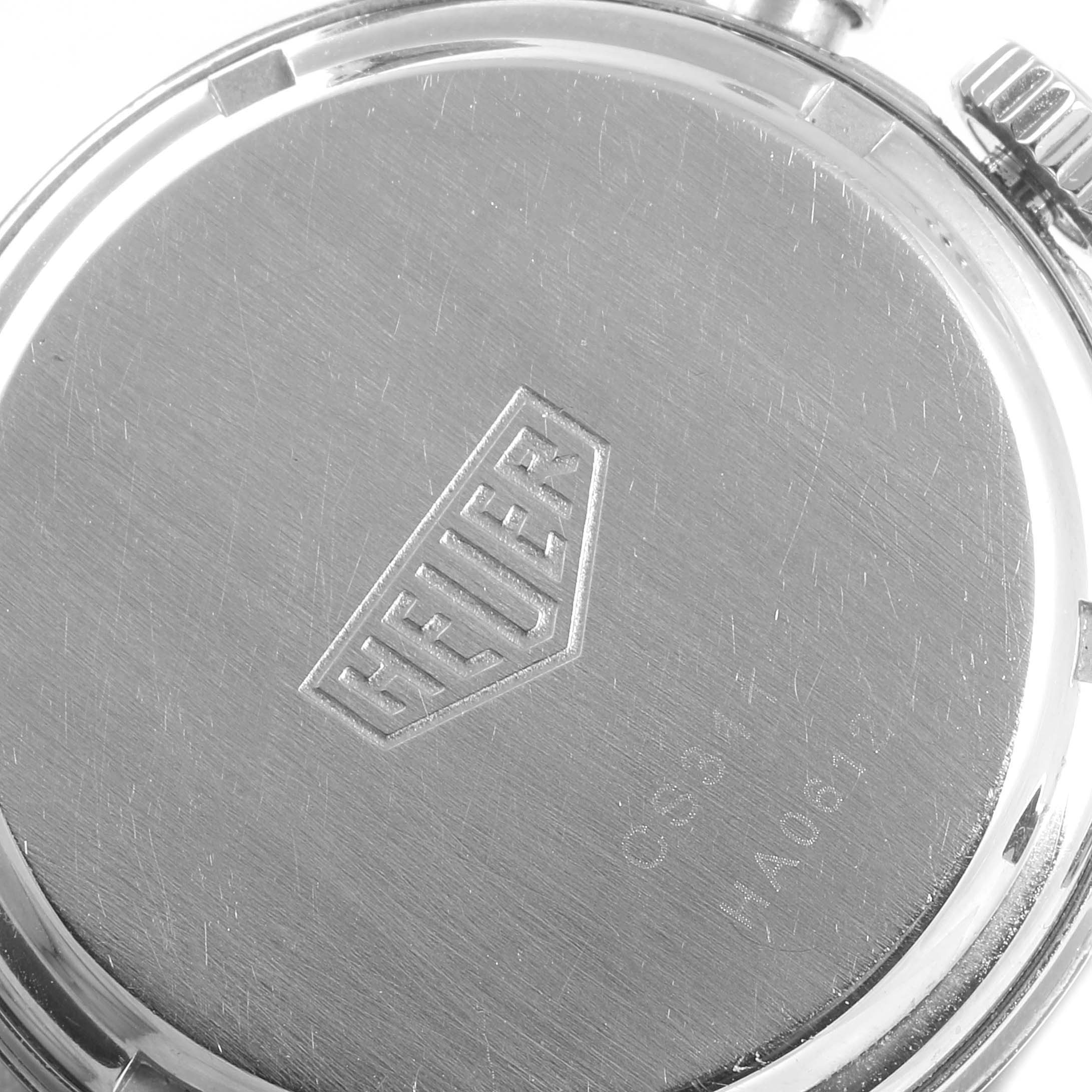 This image shows the back case of a Tag Heuer Carrera CS3111 Men
s Stainless Steel Black Dial CS3111 Men
s Stainless Steel Black Dial watch, highlighting the Heuer logo and model details.