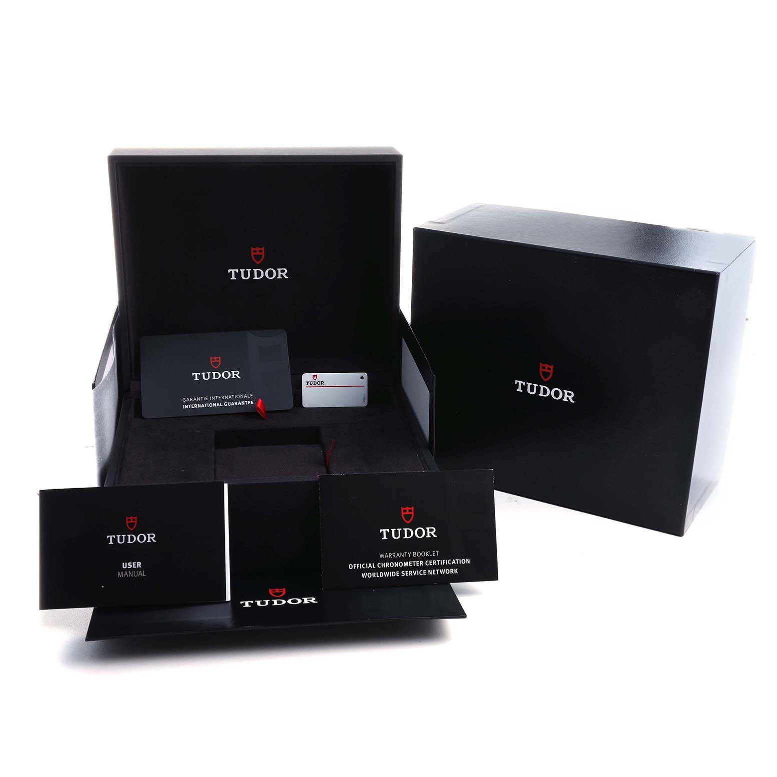 The image shows the Tudor Heritage Black Bay M79540 Men's Stainless Steel Silver Dial watch packaging with manuals, warranty card, and box at a front angle.