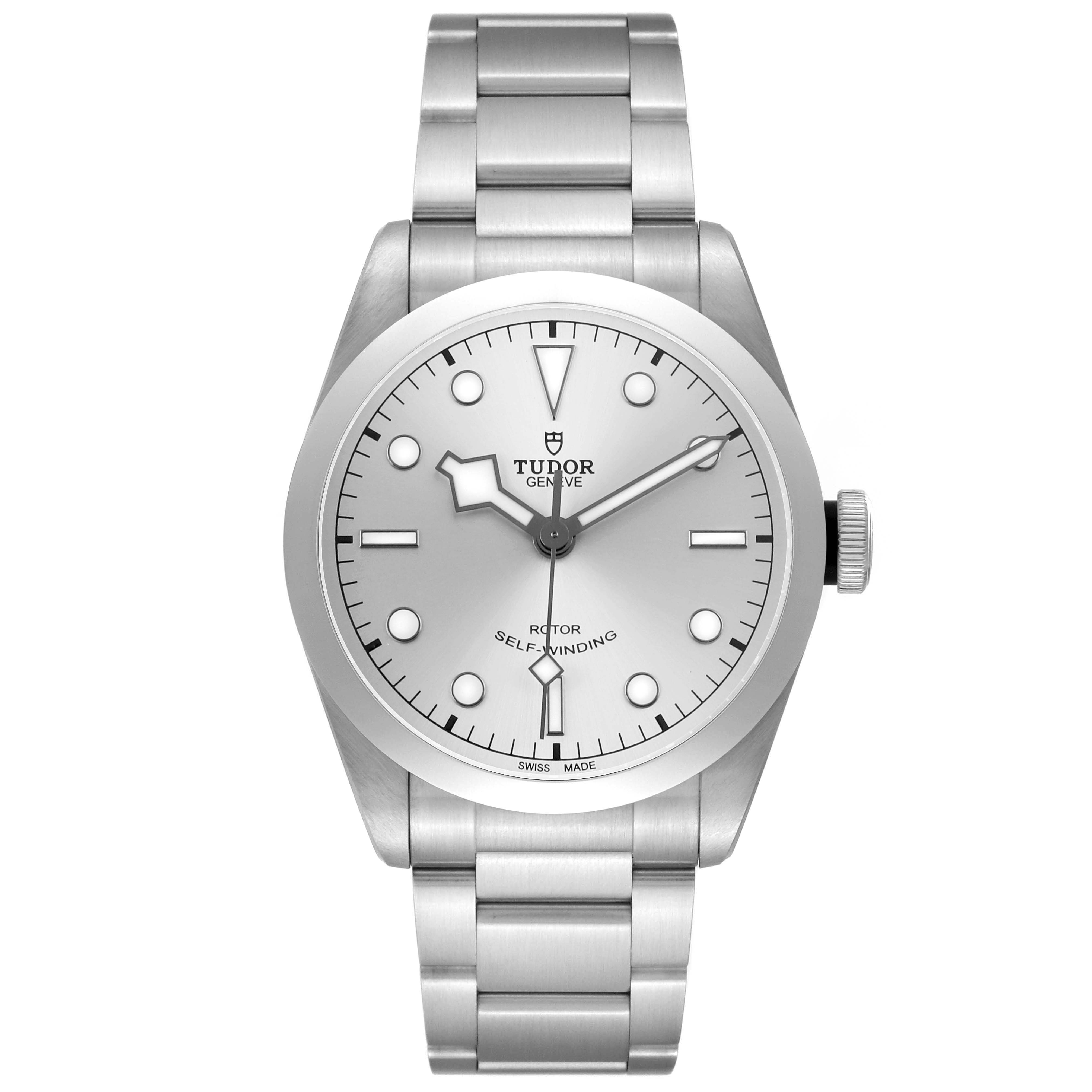 The Tudor Heritage Black Bay M79540 Men's Stainless Steel Silver Dial watch is shown from a front angle, displaying its dial, hands, and bracelet.