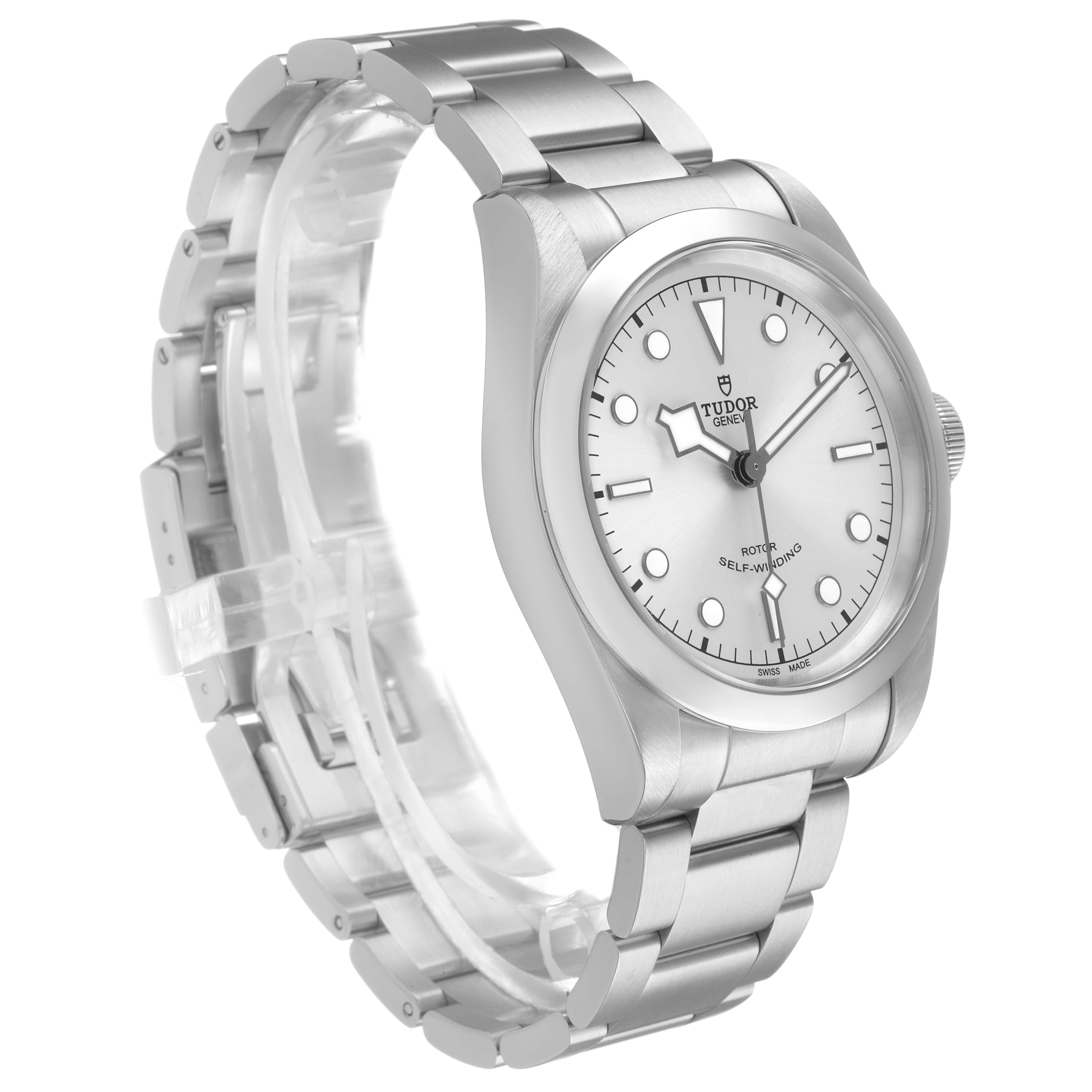 The Tudor Heritage Black Bay M79540 Men's Stainless Steel Silver Dial watch is shown from a three-quarter angle highlighting the face, bezel, and bracelet.