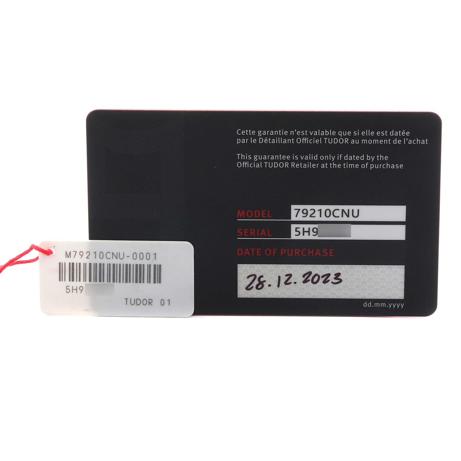 The image shows the warranty card for the Tudor Heritage Black Bay 79210 Men's Ceramic Black Dial 79210 Men's Ceramic Black Dial model 79210CNU, displaying model, serial, and purchase date.