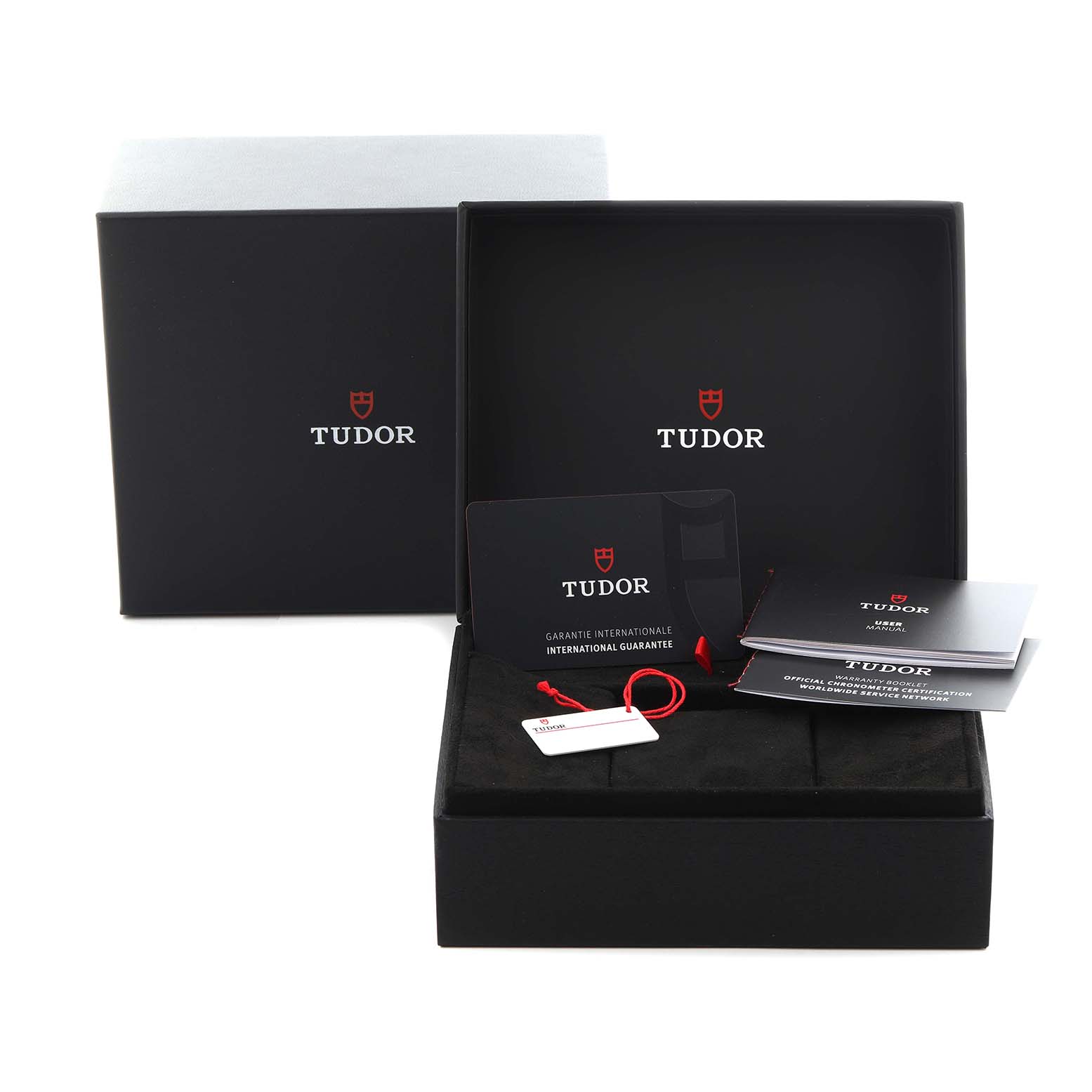 The image shows the Tudor Heritage Black Bay 79000N Men's Stainless Steel Black Dial 79000N Men's Stainless Steel Black Dial watch packaging, warranty card, and manuals from a frontal angle.