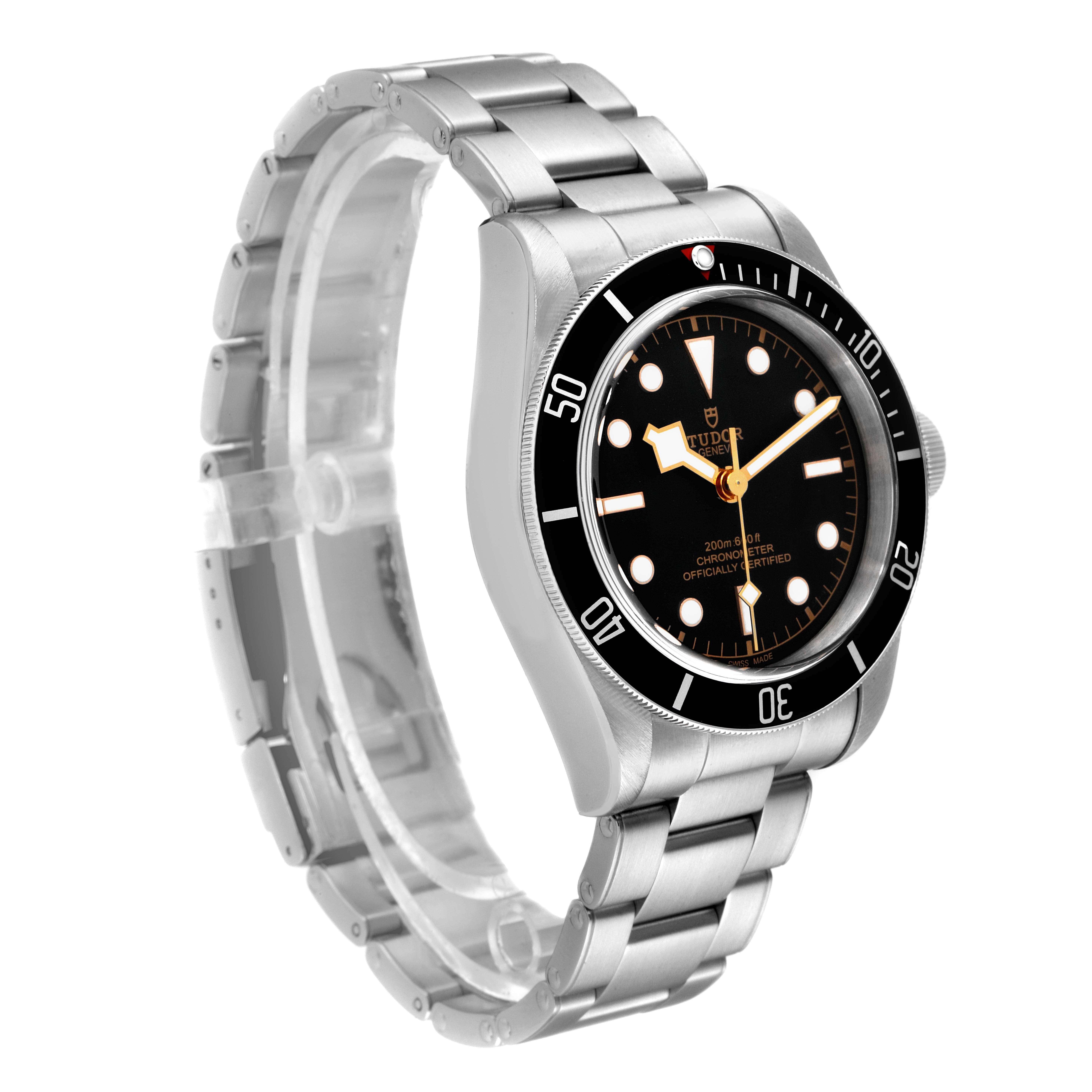 The image shows a Tudor Heritage Black Bay 79230 Men's Stainless Steel Black Dial 79230 Men's Stainless Steel Black Dial watch angled to display the face, bezel, and bracelet.