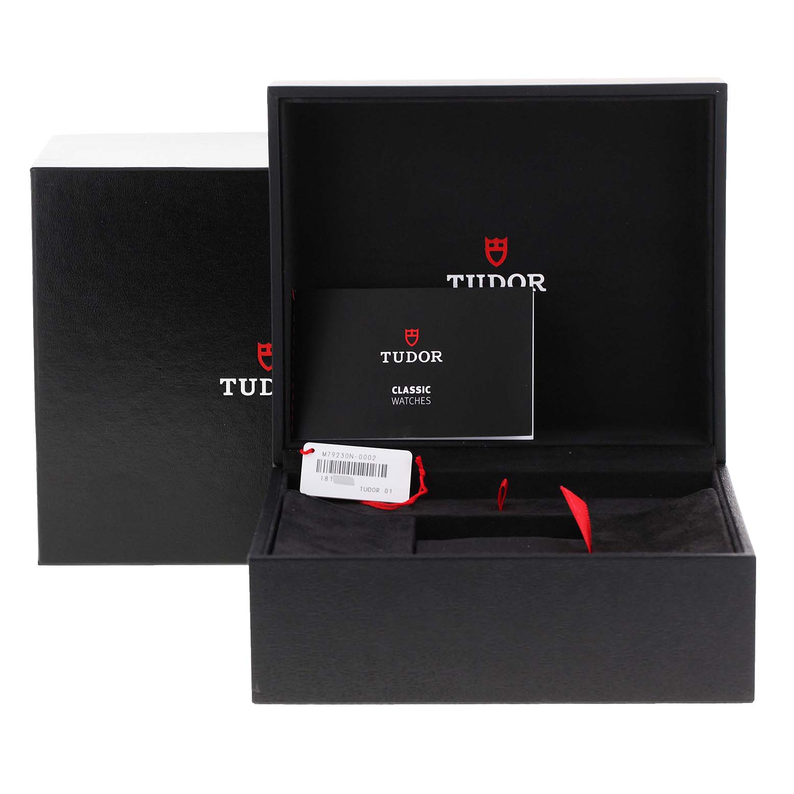 The image shows the open box and paperwork of a Tudor Heritage Black Bay 79230 Men's Stainless Steel Black Dial 79230 Men's Stainless Steel Black Dial watch.