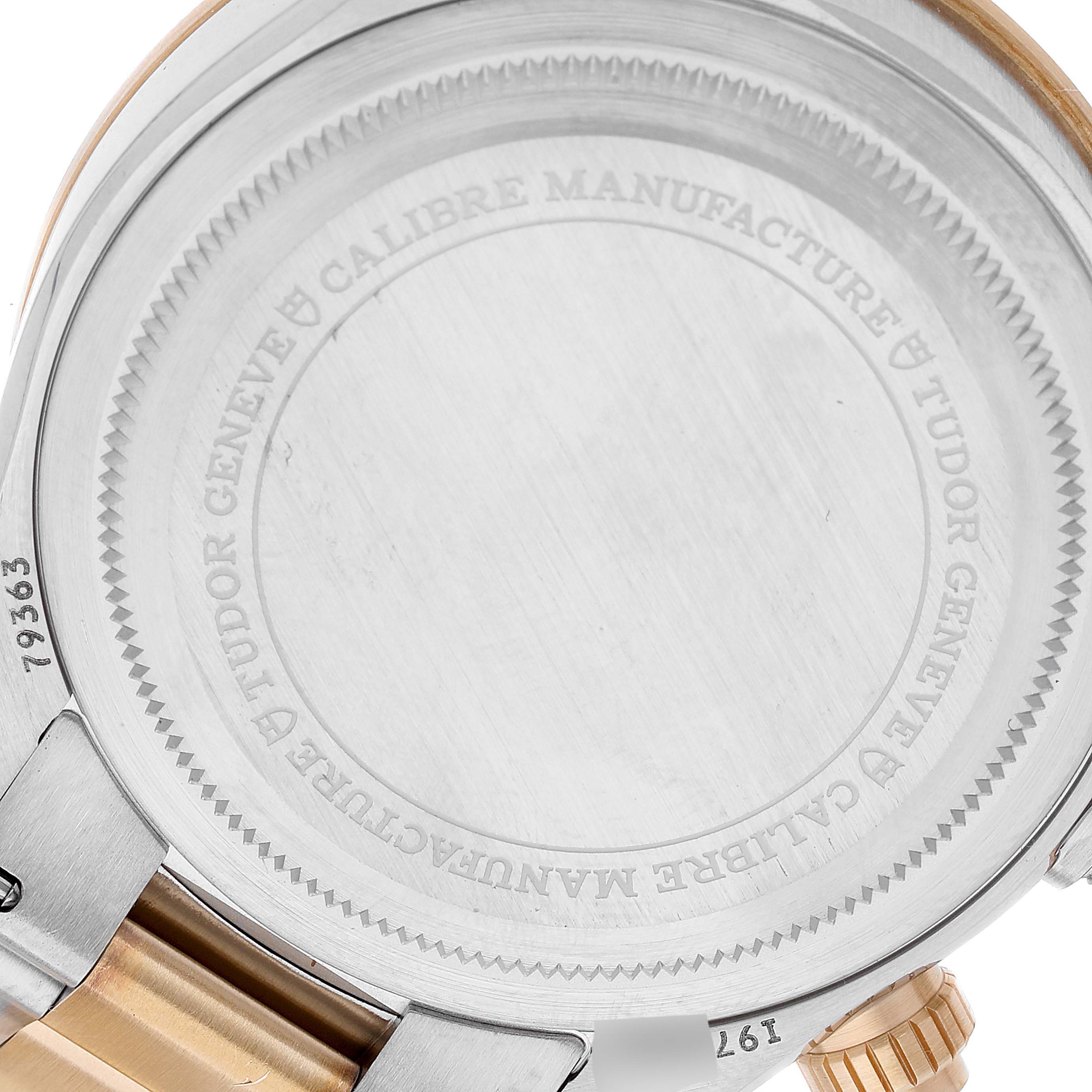 The image shows the back case of a Tudor Heritage Black Bay 79363 Men's Steel and Gold (two tone) Black Dial 79363 Men's Steel and Gold (two tone) Black Dial watch from a close-up, angled from the rear side.