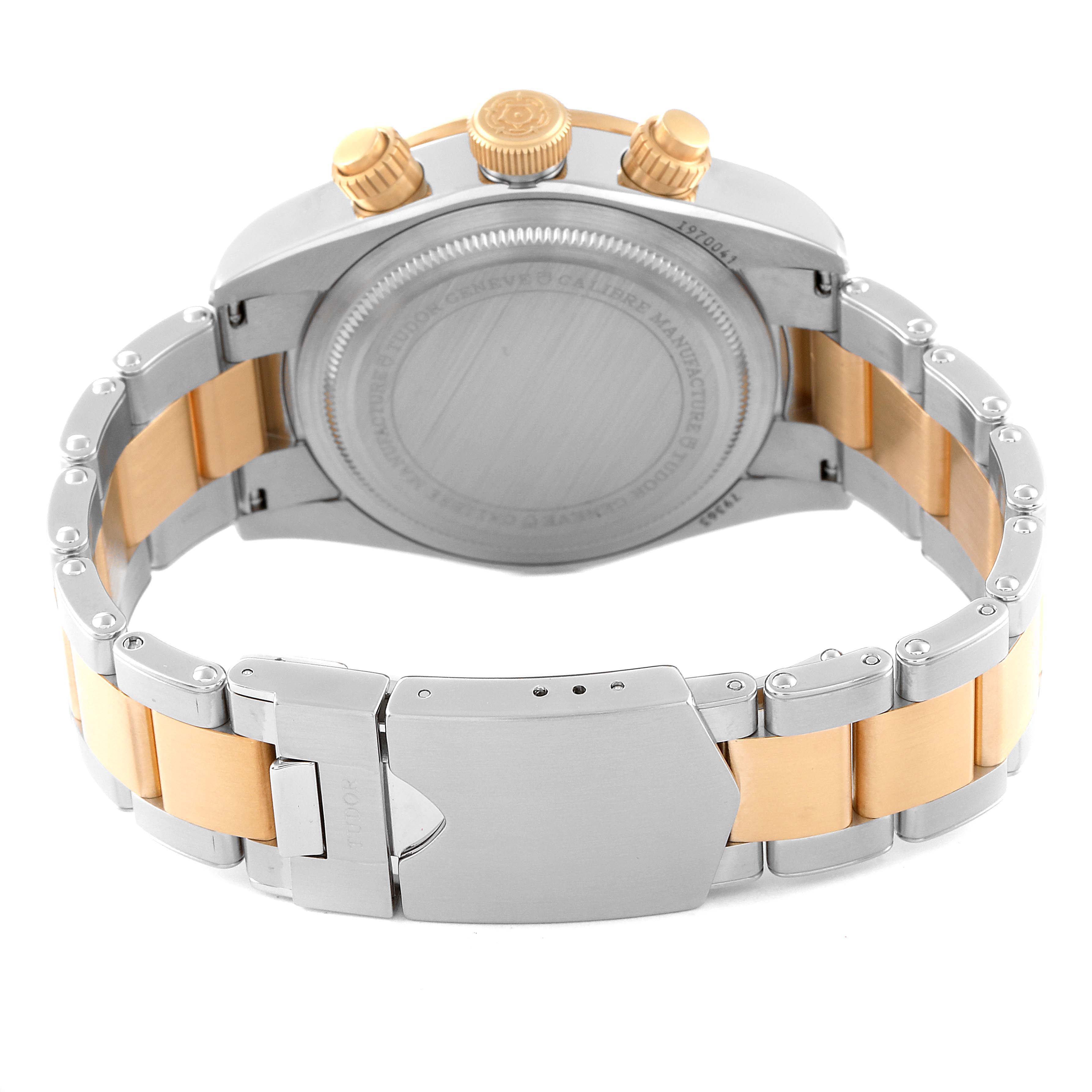 The image shows the back case and bracelet of a Tudor Heritage Black Bay 79363 Men's Steel and Gold (two tone) Black Dial 79363 Men's Steel and Gold (two tone) Black Dial watch, highlighting the two-tone metal design and clasp.