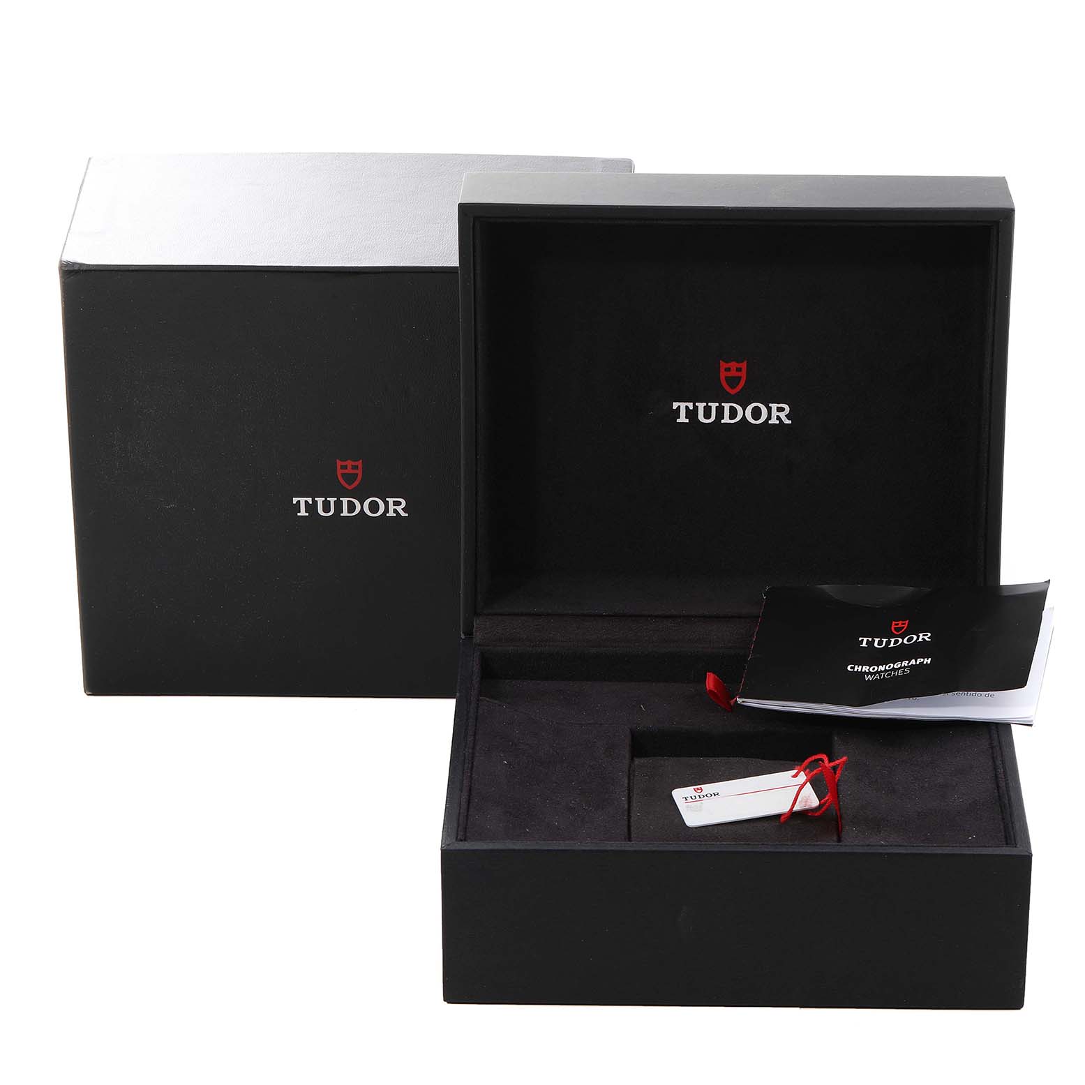 The image shows the open packaging box of a Tudor Heritage Black Bay 79363 Men's Steel and Gold (two tone) Black Dial 79363 Men's Steel and Gold (two tone) Black Dial watch, including tags and booklets.