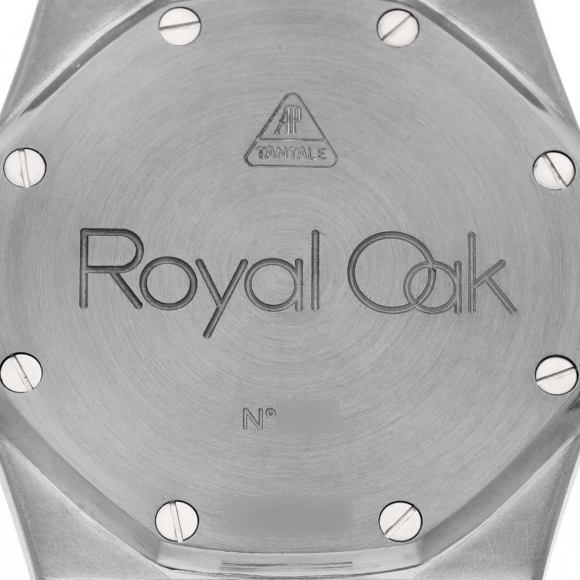 The image shows the case back of the Audemars Piguet Royal Oak 15000TR Men's Titanium Pink Dial, highlighting screws and engraving.