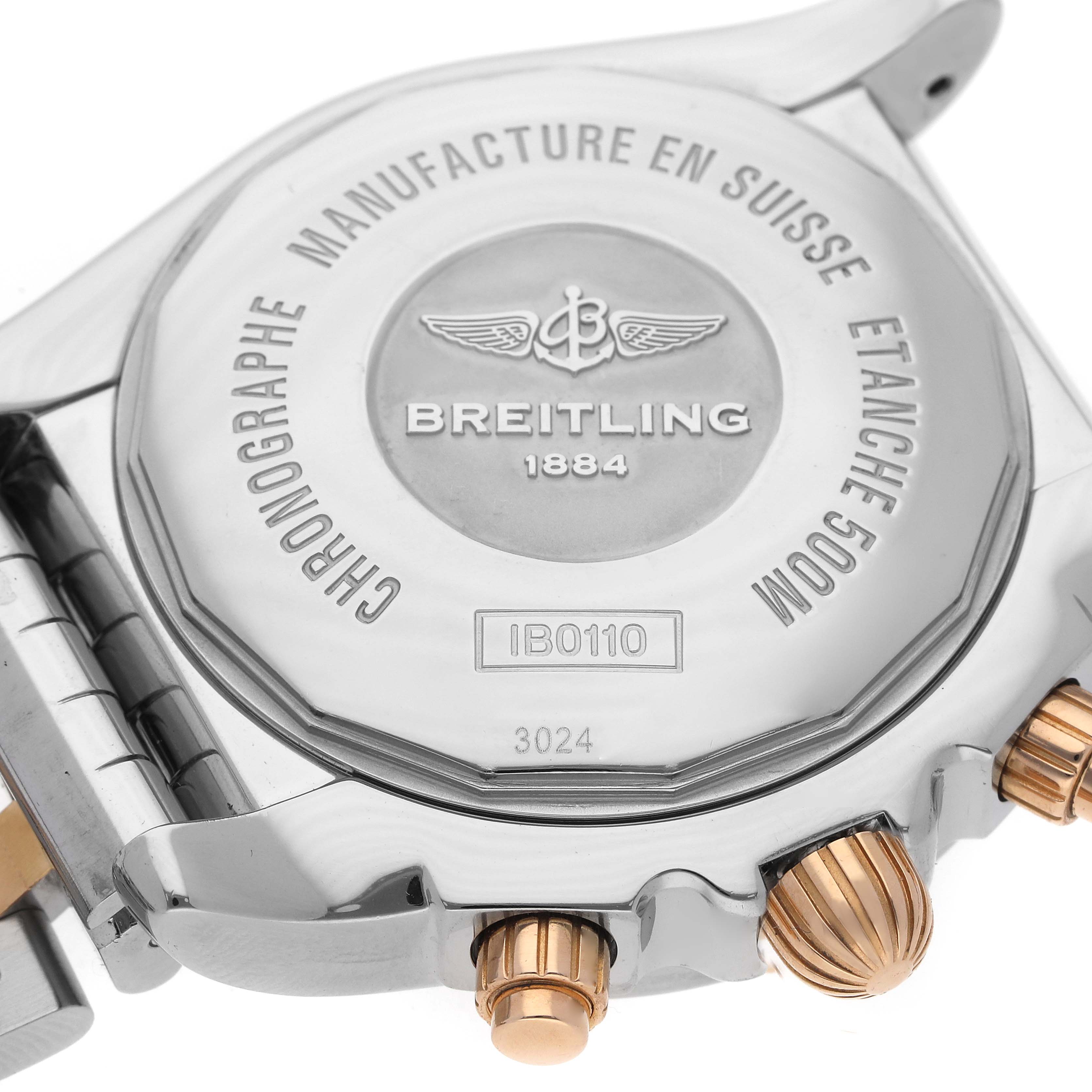 The image shows the back case and side view of a Breitling Chronomat IB0110 Men's Steel and Gold (two tone) Black Dial IB0110 Men's Steel and Gold (two tone) Black Dial, featuring crown and pushers.