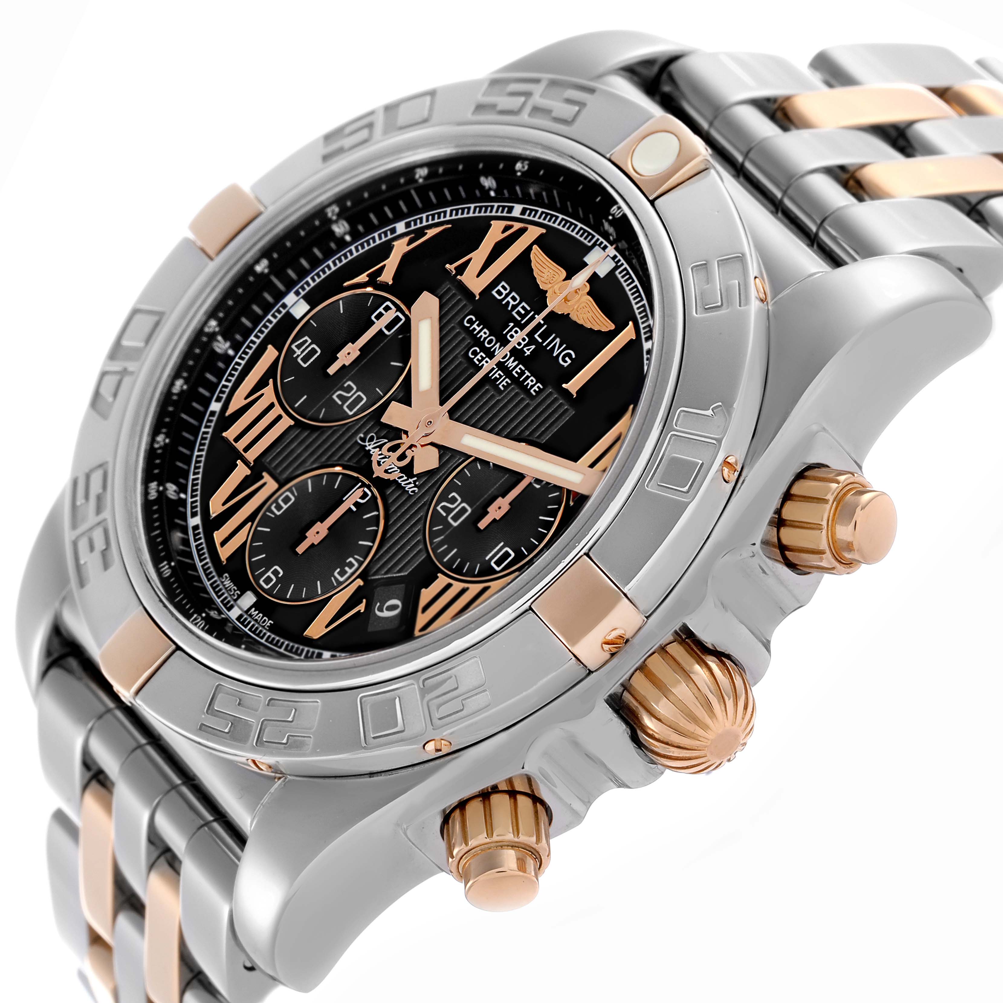The Breitling Chronomat IB0110 Men's Steel and Gold (two tone) Black Dial IB0110 Men's Steel and Gold (two tone) Black Dial watch is angled to show the face, bezel, crown, pushers, and part of the bracelet.