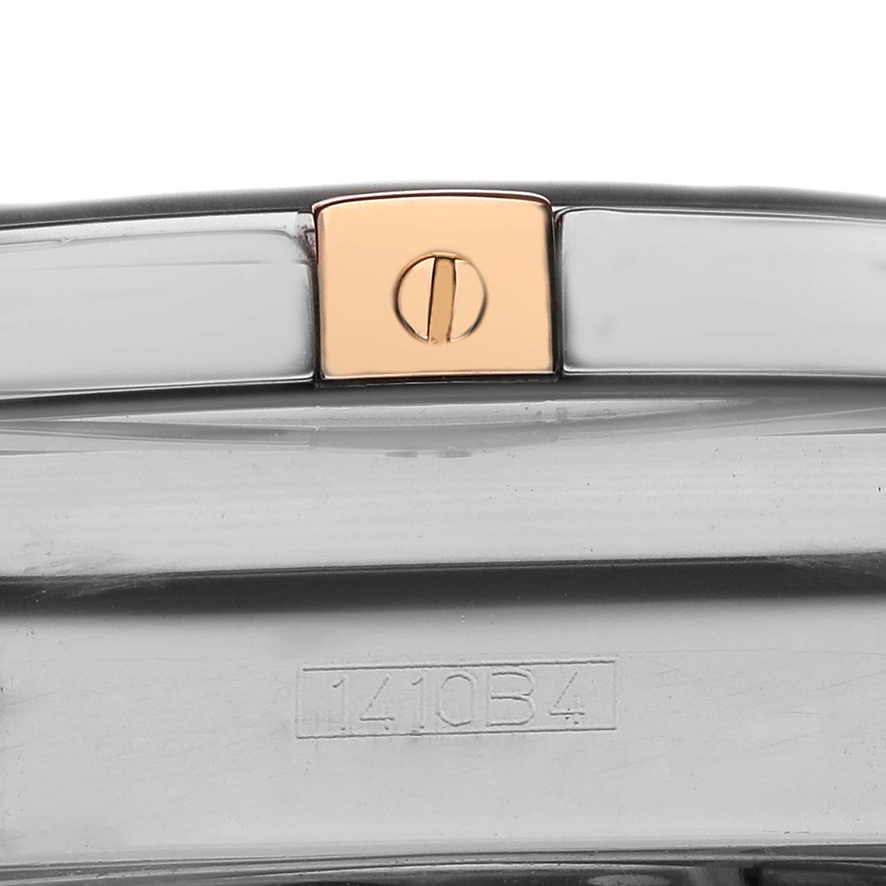 The image shows part of the band of a Breitling Chronomat IB0110 Men's Steel and Gold (two tone) Black Dial IB0110 Men's Steel and Gold (two tone) Black Dial watch, highlighting a clasp with a gold detail.