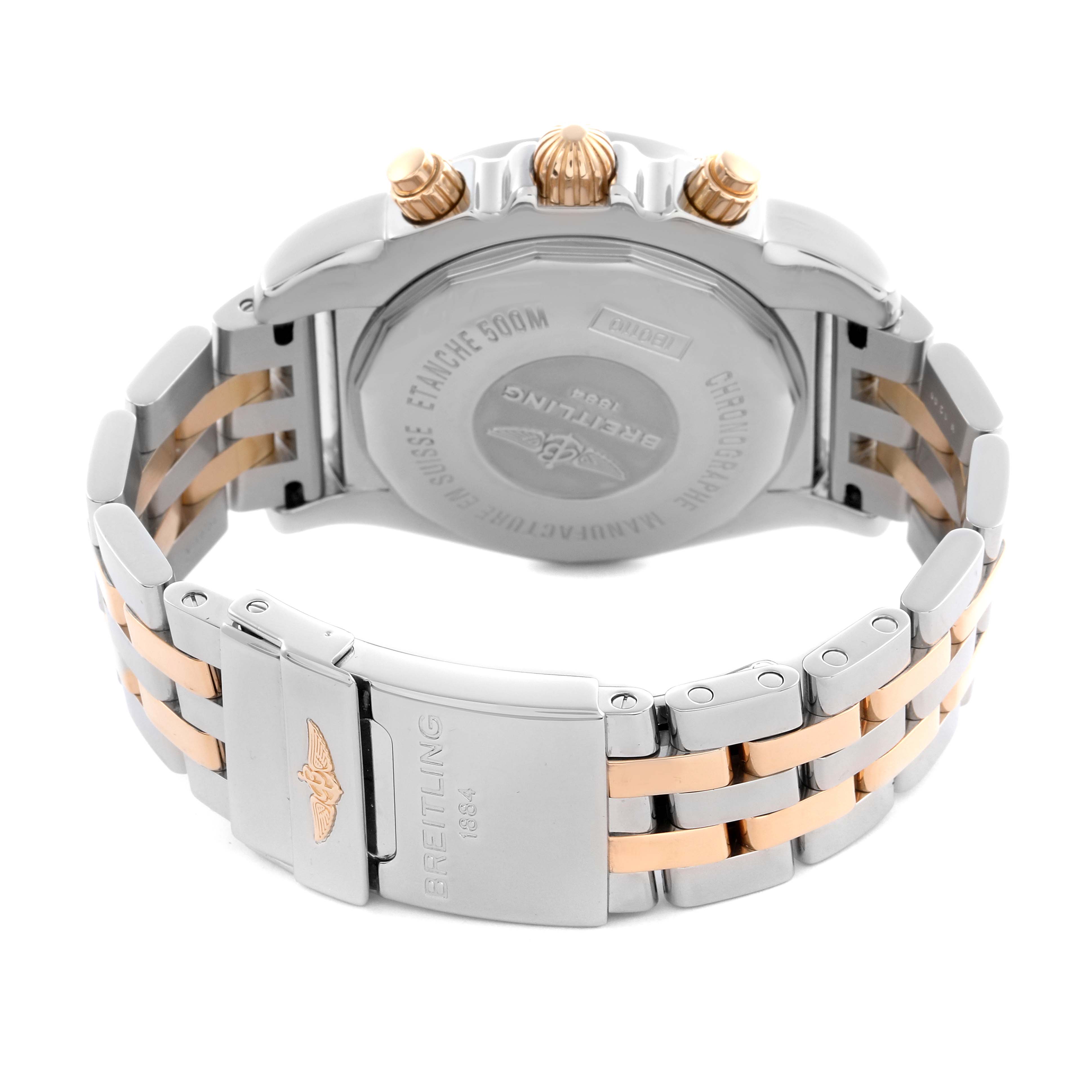 The image shows the back case and bracelet of a Breitling Chronomat IB0110 Men's Steel and Gold (two tone) Black Dial IB0110 Men's Steel and Gold (two tone) Black Dial watch, highlighting its two-tone links and deployment clasp.