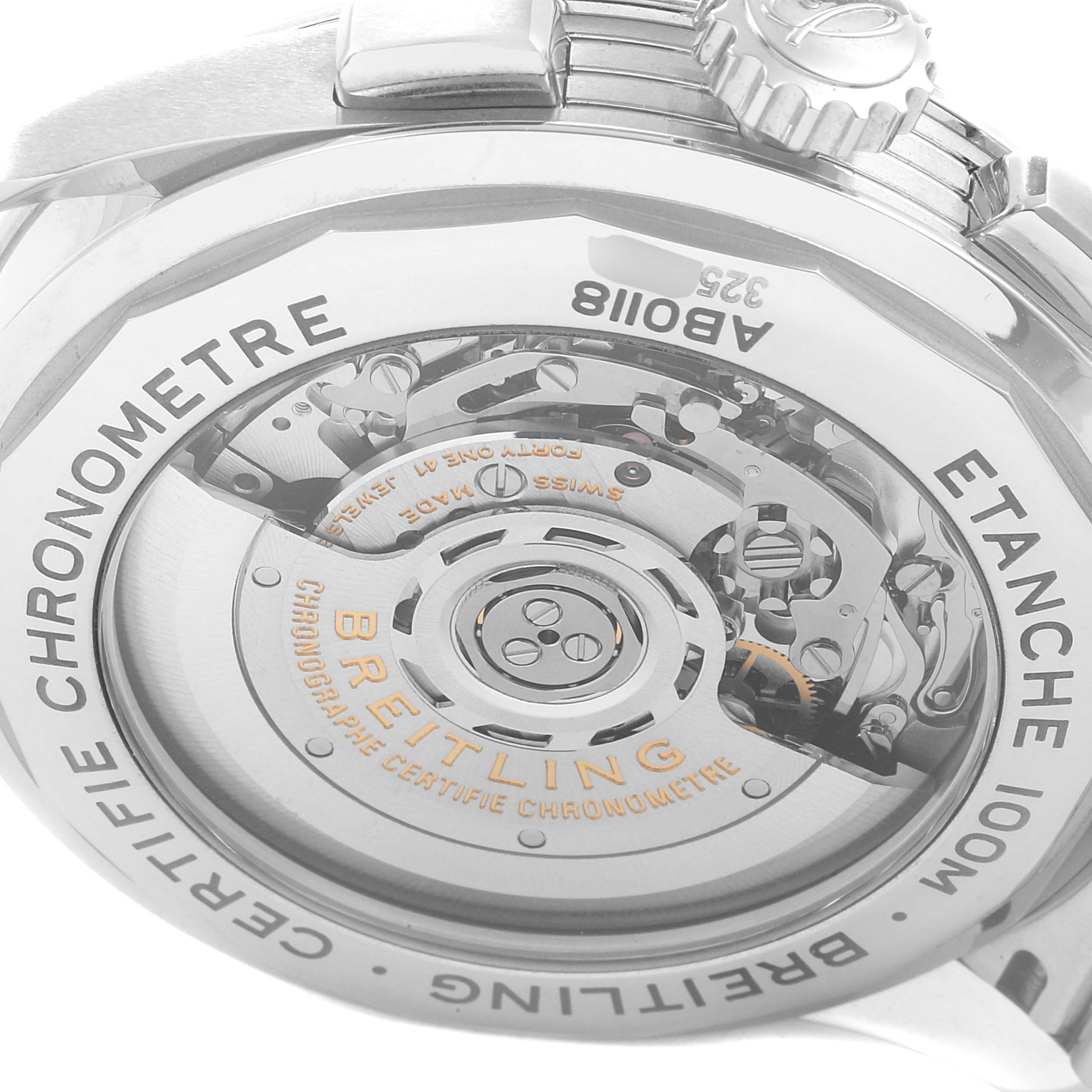 The image shows the back of the Breitling Premier AB0118 Men's Stainless Steel Blue Dial AB0118 Men's Stainless Steel Blue Dial watch, displaying its intricate inner mechanism and engravings.