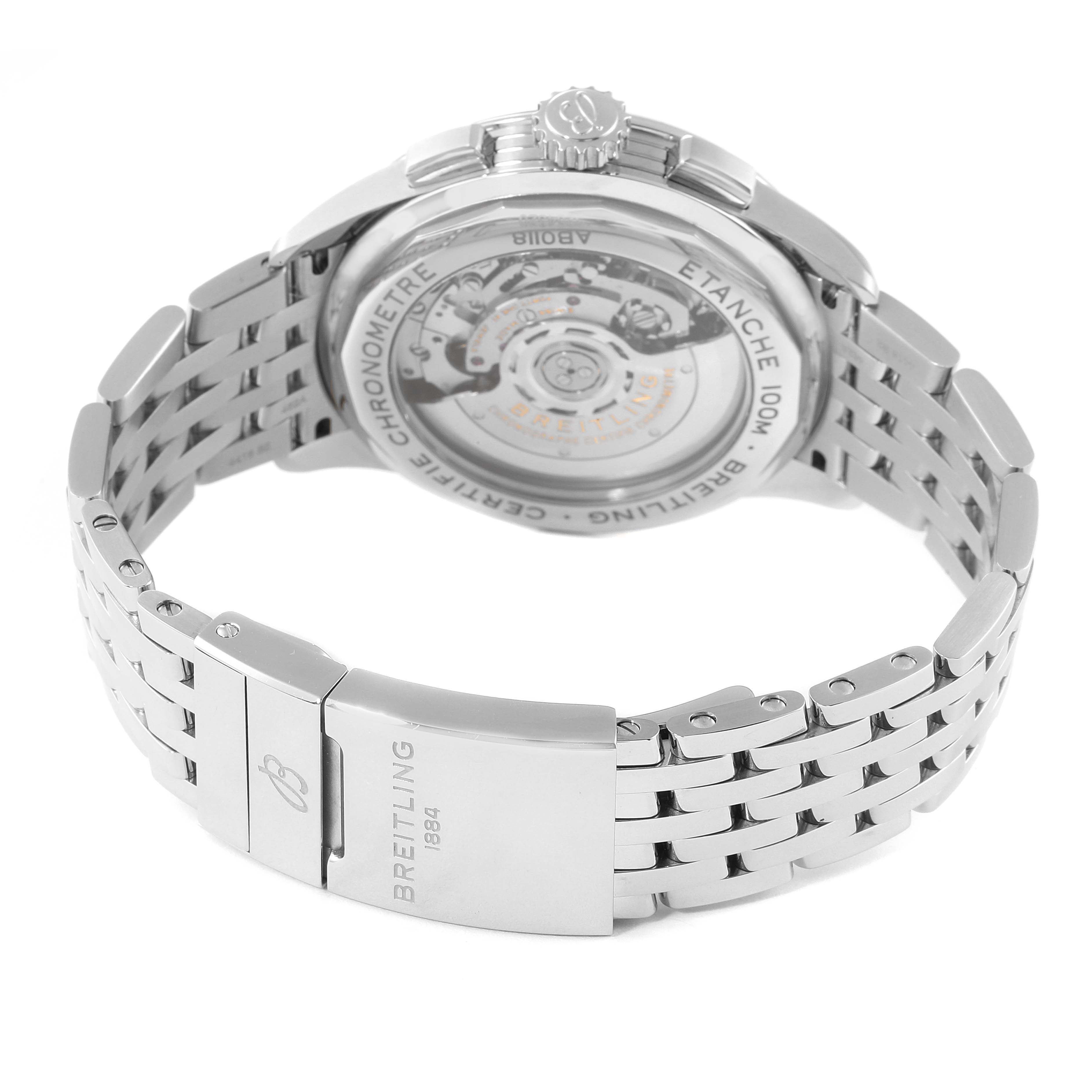 The image shows the Premier model by Breitling from the back angle, highlighting the case back and stainless steel bracelet.