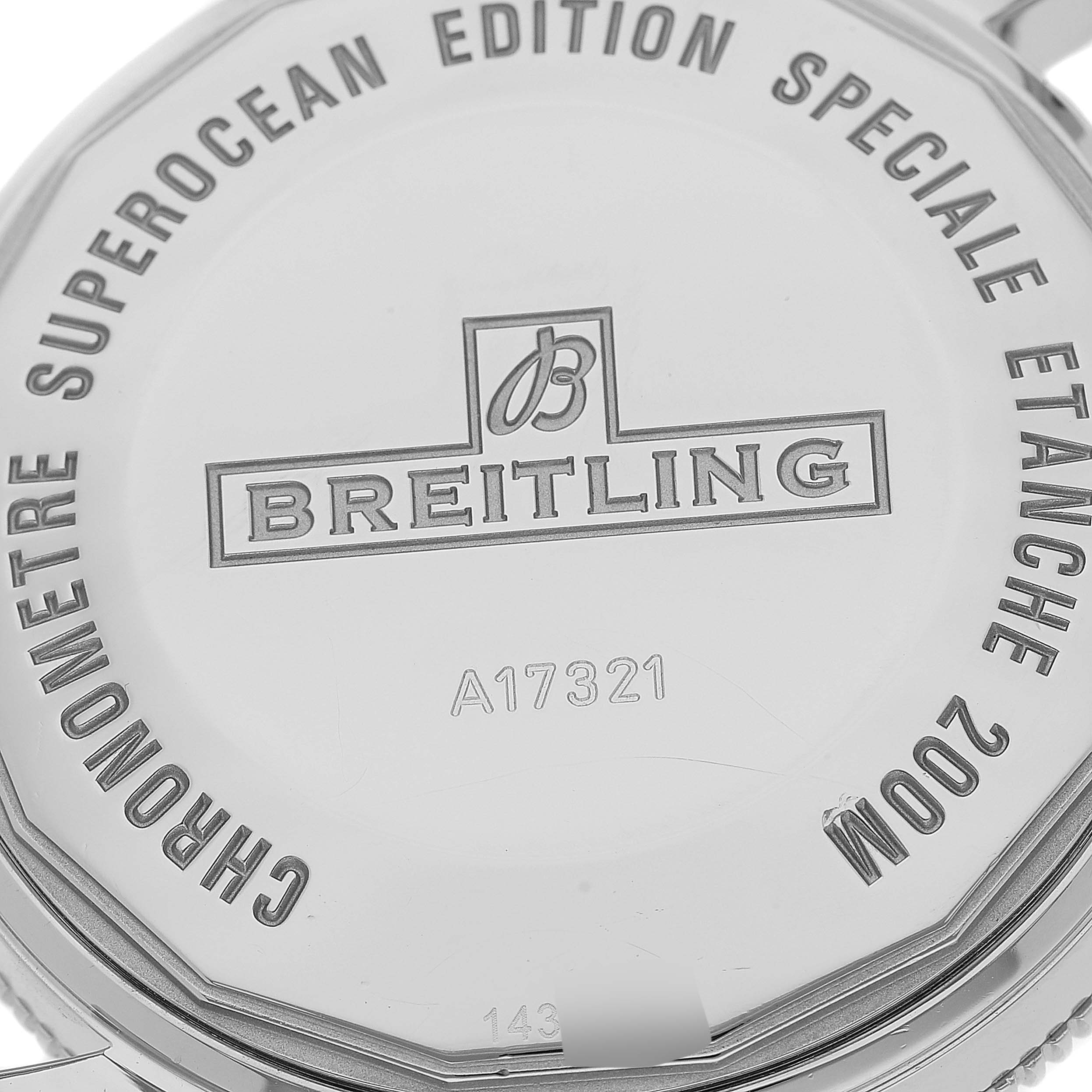 The image shows the back of the case for the Breitling Superocean A17321 Men's Stainless Steel Silver Dial A17321 Men's Stainless Steel Silver Dial watch, highlighting its engravings and branding.