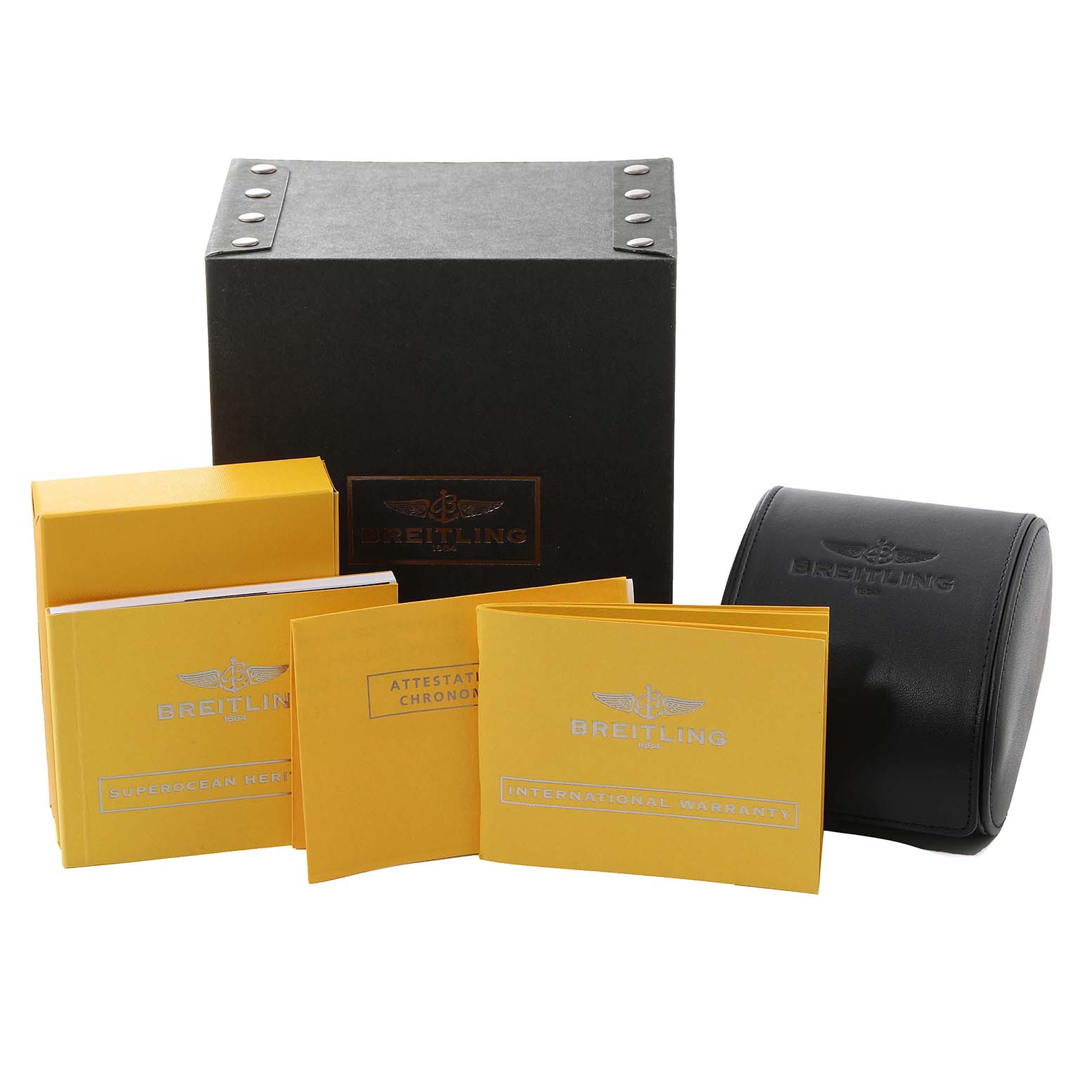 The image shows the packaging, warranty booklets, and a leather case for a Breitling Superocean A17321 Men's Stainless Steel Silver Dial A17321 Men's Stainless Steel Silver Dial watch.