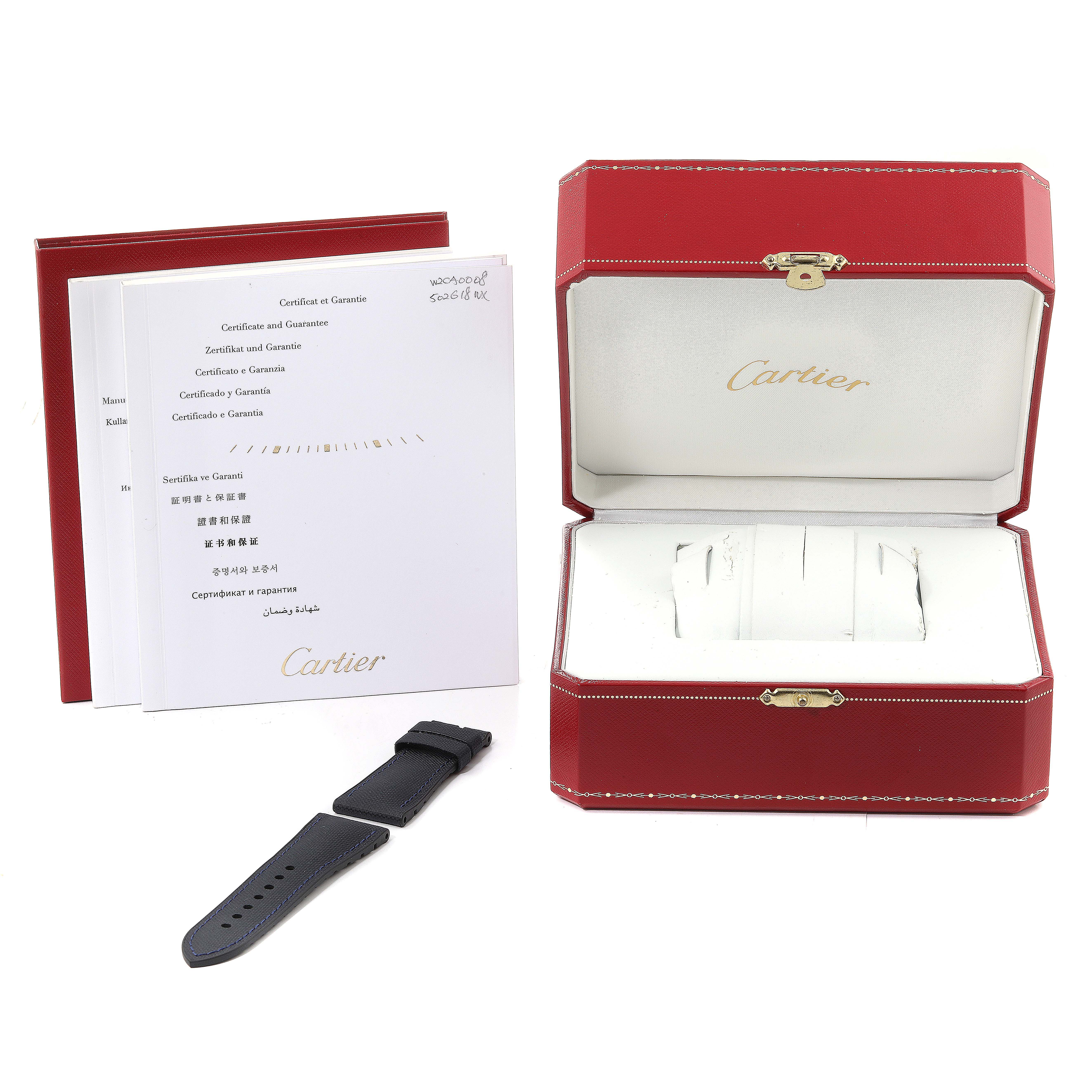 The image shows the packaging, a strap, and documents for the Calibre de Cartier watch by Cartier.