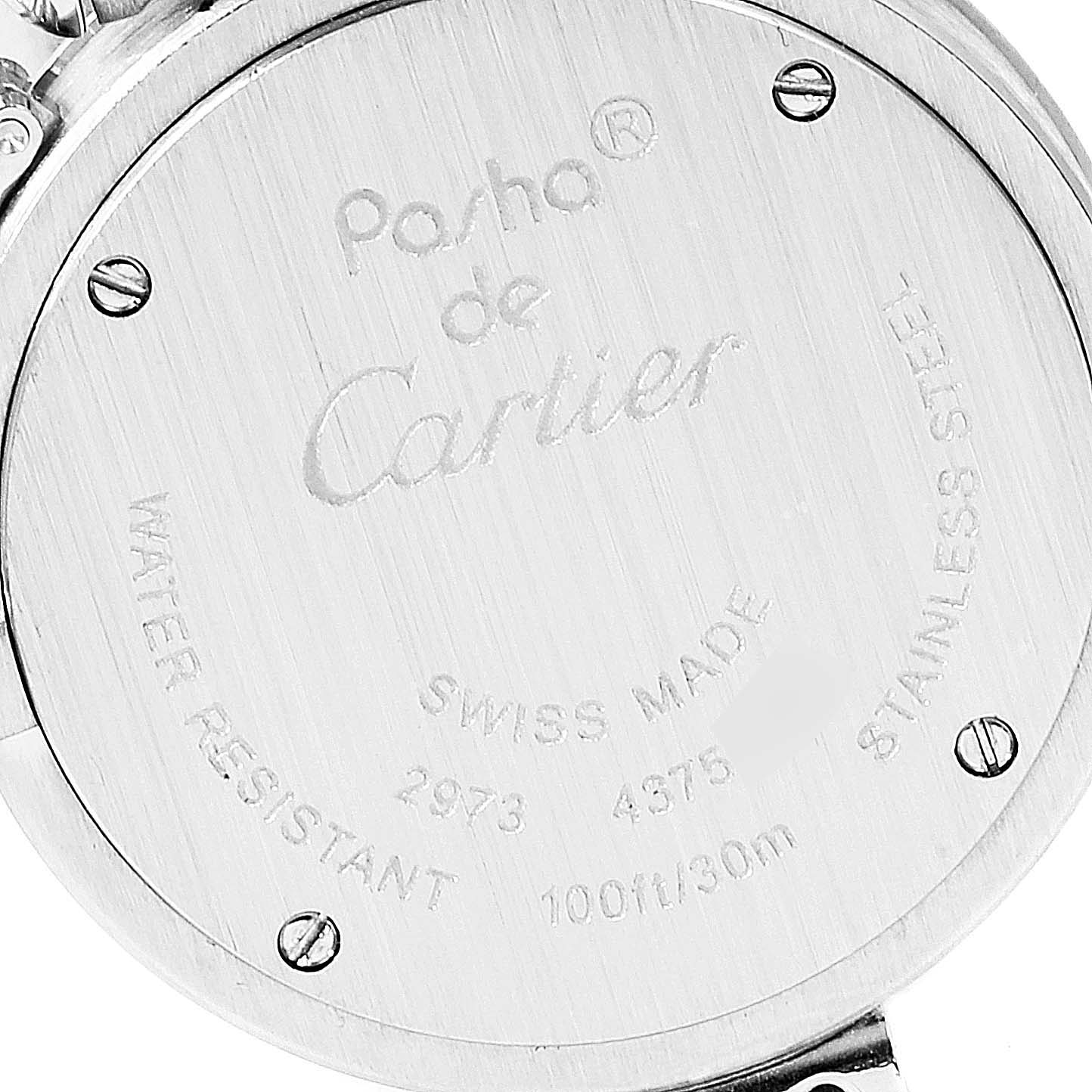 The image shows the back case of a Cartier Pasha W3140008 Women's Stainless Steel Pink Dial W3140008 Women's Stainless Steel Pink Dial watch, highlighting engravings and screws.