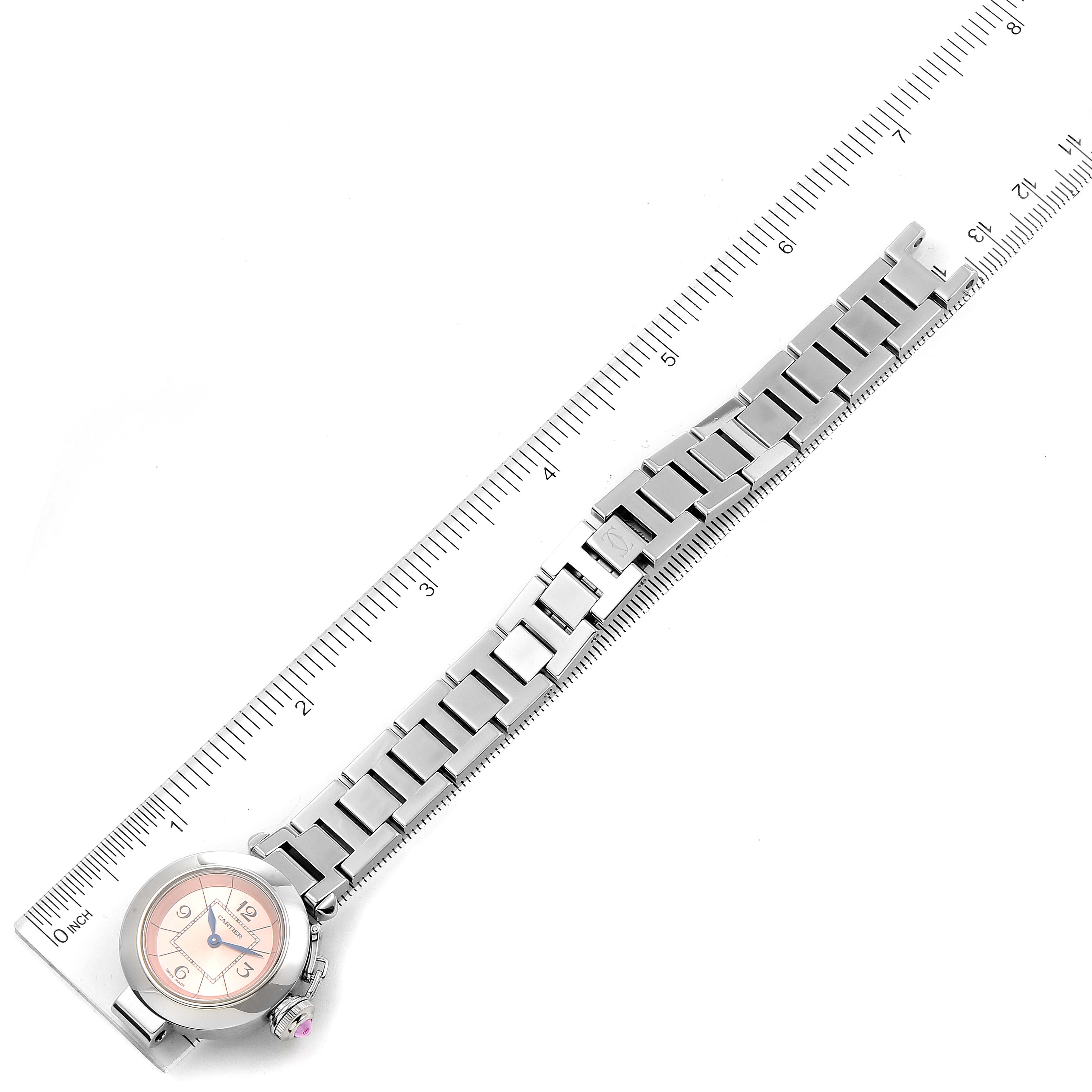 The image shows a Cartier Pasha W3140008 Women's Stainless Steel Pink Dial W3140008 Women's Stainless Steel Pink Dial watch laid flat with a metal bracelet, alongside a ruler for size reference.