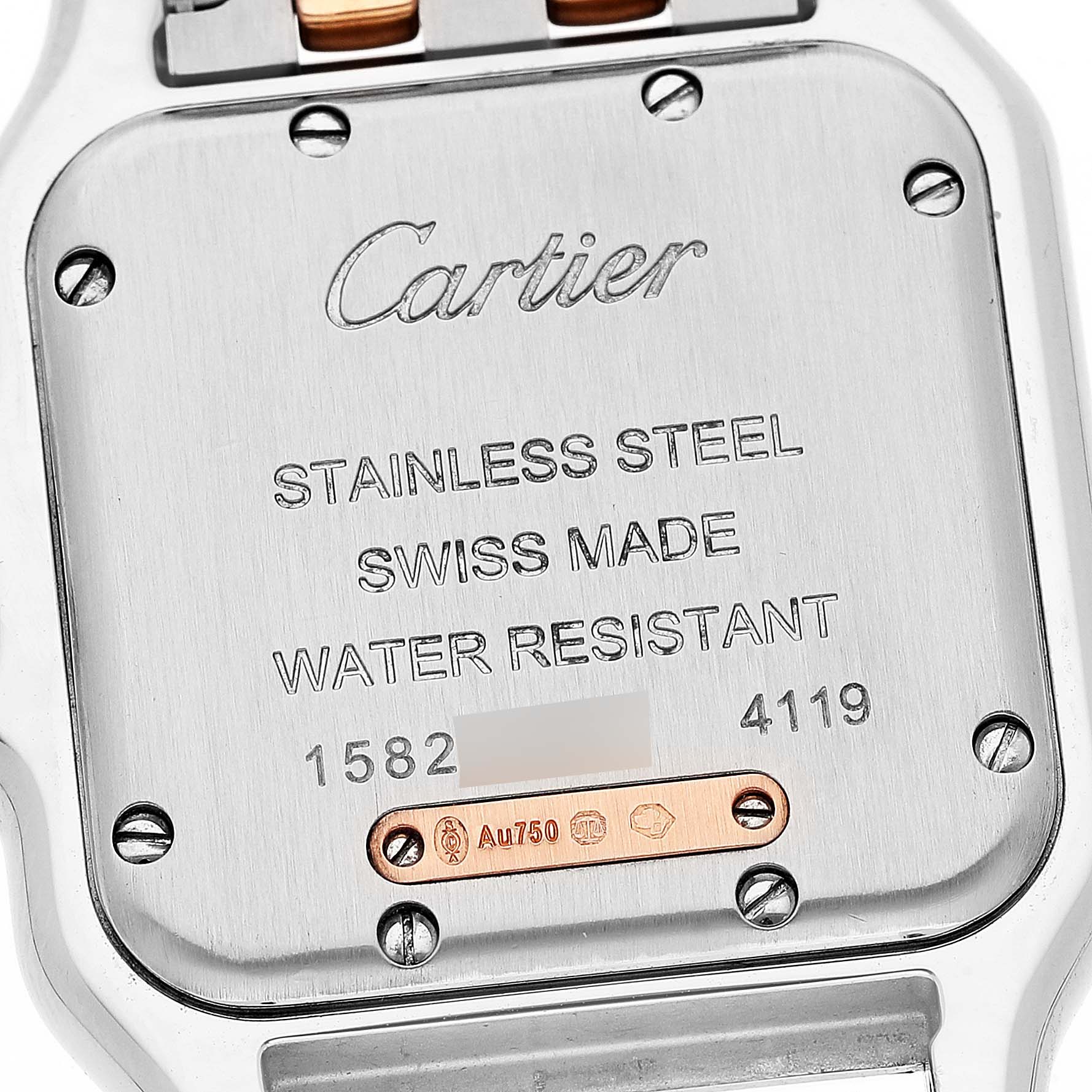 The image shows the back case of a Cartier Panthere W3PN0007 Women
s Steel and Gold (two tone) Silver Dial W3PN0007 Women
s Steel and Gold (two tone) Silver Dial watch, displaying engraved details and screws.