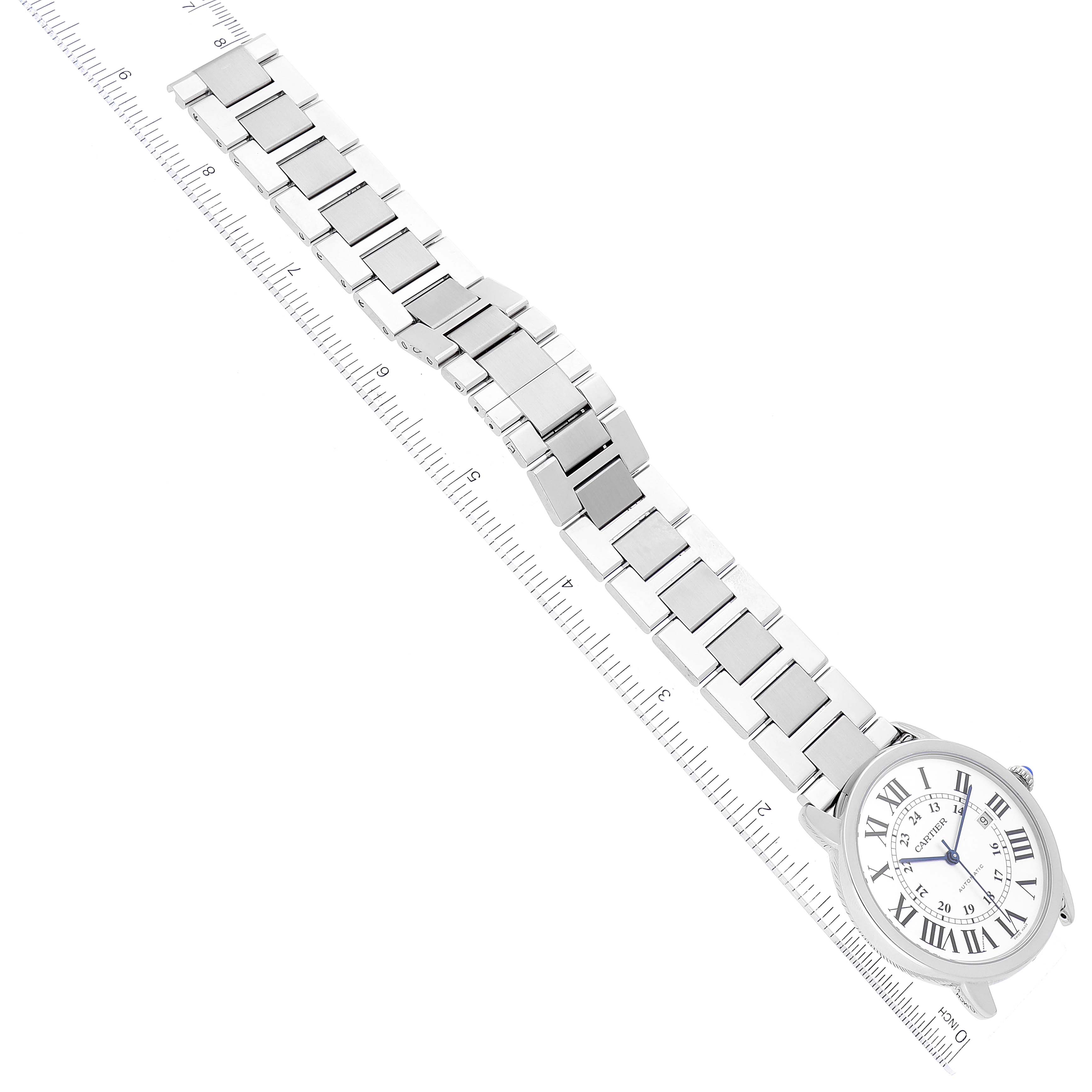 The image shows a Cartier Ronde W6701011 Men
s Stainless Steel Silver Dial W6701011 Men
s Stainless Steel Silver Dial watch laid flat with a metal bracelet and a ruler for scale.
