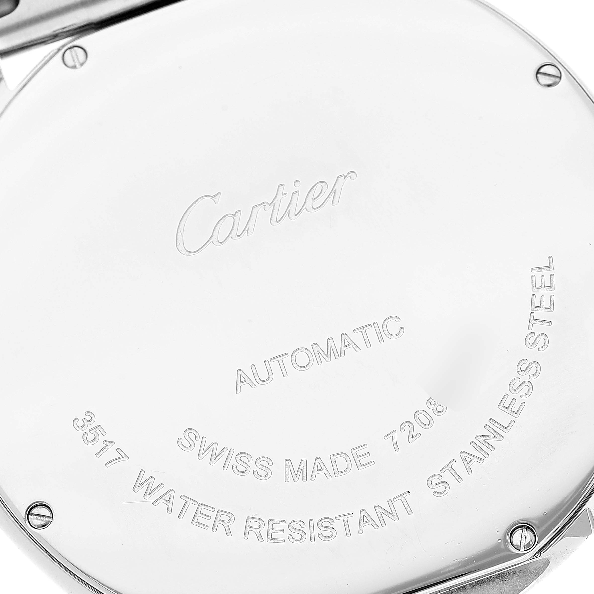 This image shows the back casing of a Cartier Ronde W6701011 Men
s Stainless Steel Silver Dial W6701011 Men
s Stainless Steel Silver Dial model watch, highlighting its inscriptions and screws.