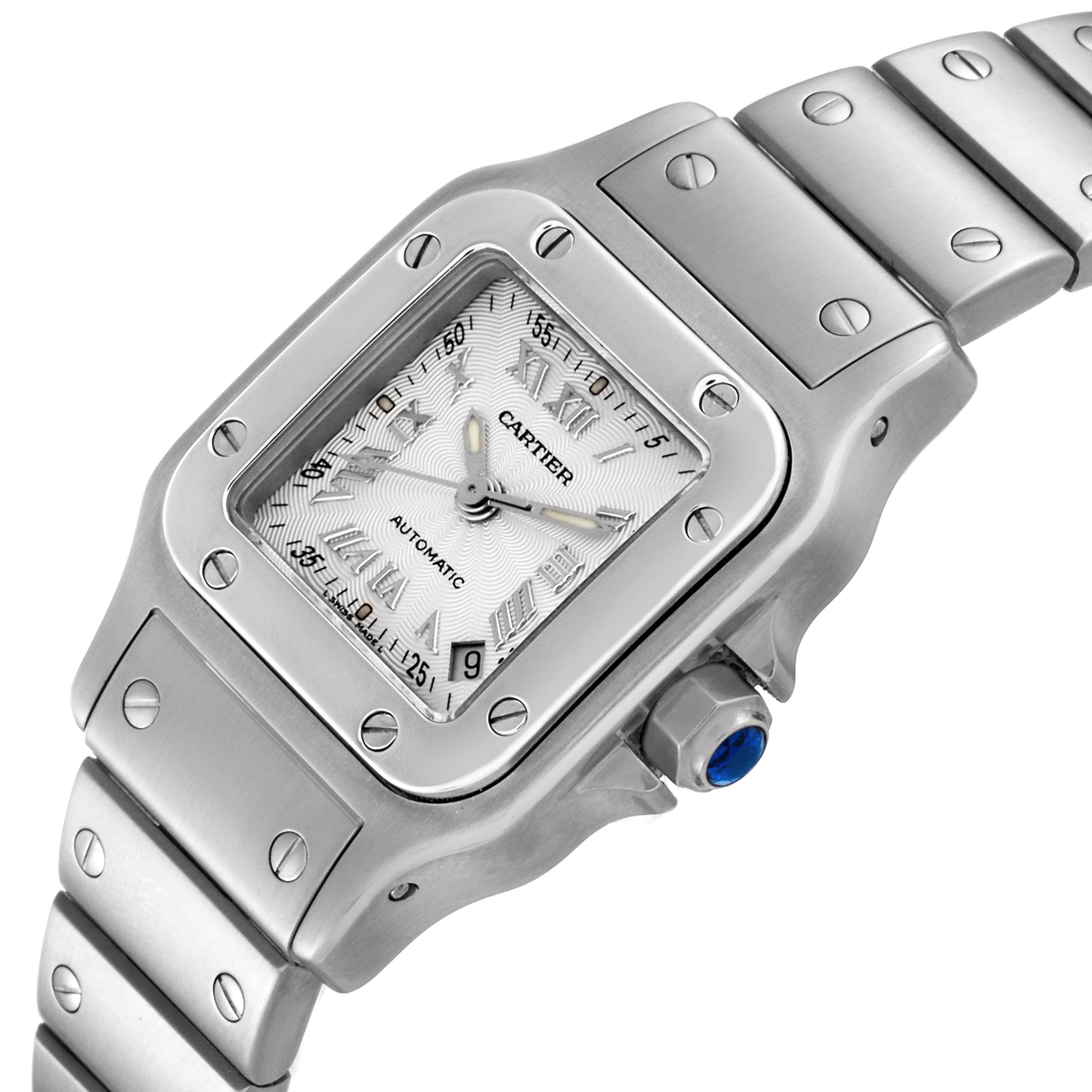 This image shows a close-up angle of the Cartier Santos W20044D6 Women's Stainless Steel Silver Dial W20044D6 Women's Stainless Steel Silver Dial watch face, bezel, and part of the metal bracelet.