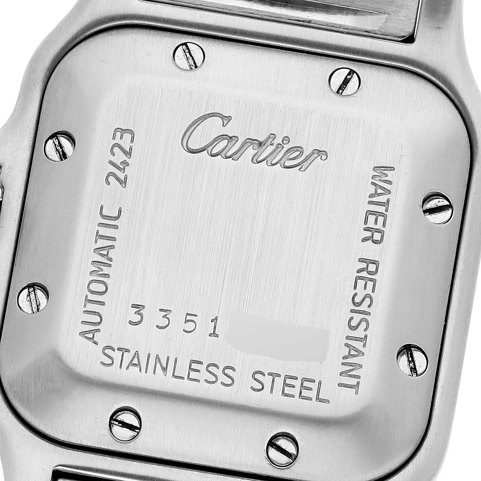 This image shows the stainless steel case back of a Cartier Santos W20044D6 Women's Stainless Steel Silver Dial W20044D6 Women's Stainless Steel Silver Dial watch, engraved with brand details and specifications.
