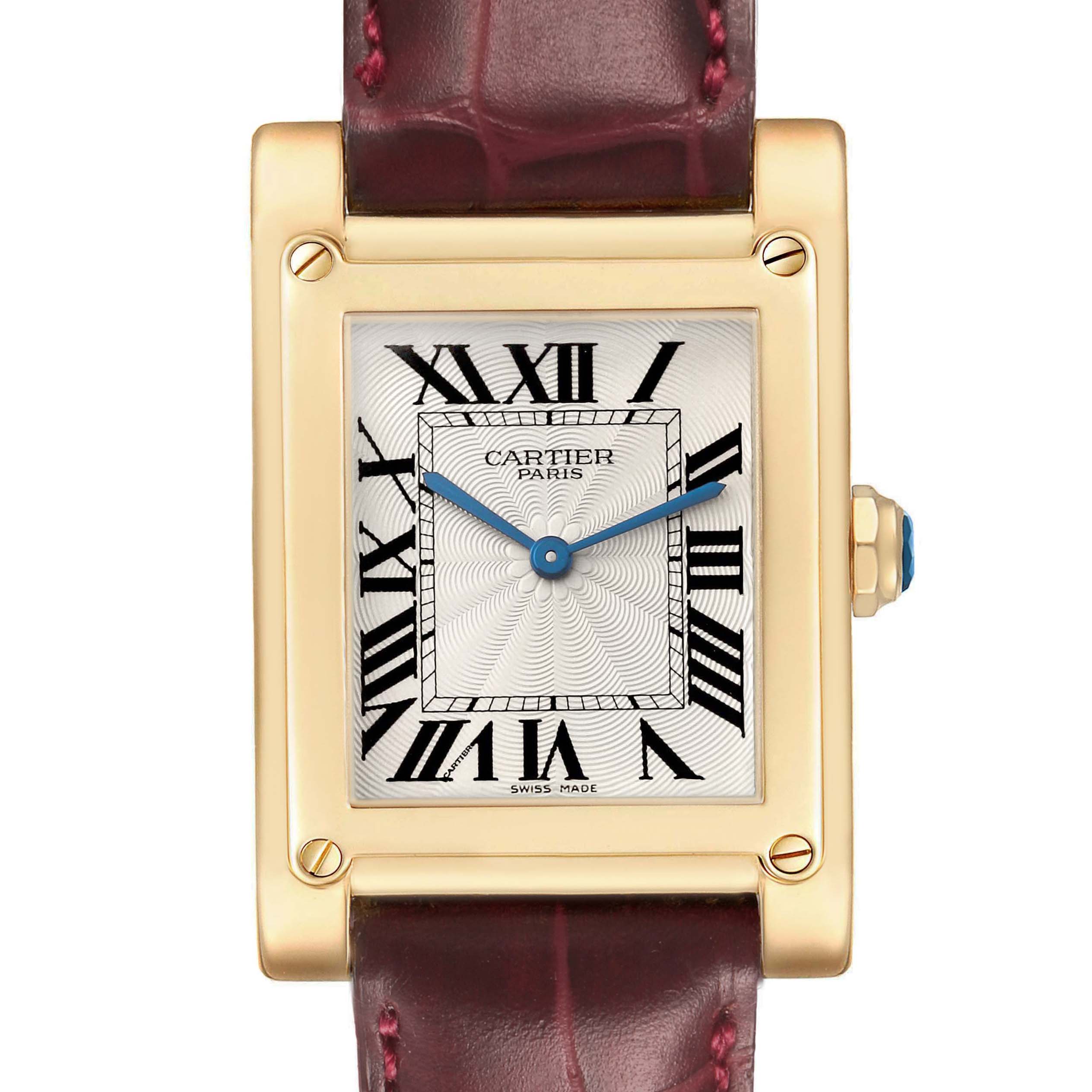 The Cartier Tank A Vis W1529451 Men's Yellow Gold Silver Dial watch is shown from the front, highlighting the face, Roman numerals, hands, and part of the strap.