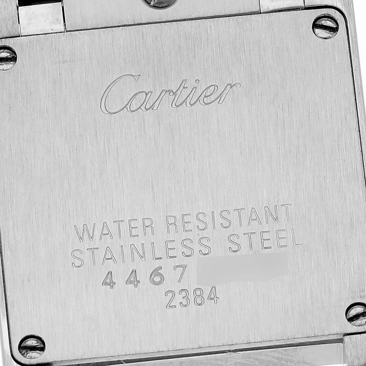 The image shows the back case of a Cartier Tank Francaise W51026Q3 Women's Stainless Steel Black Dial W51026Q3 Women's Stainless Steel Black Dial watch, highlighting its stainless steel material and water resistance.