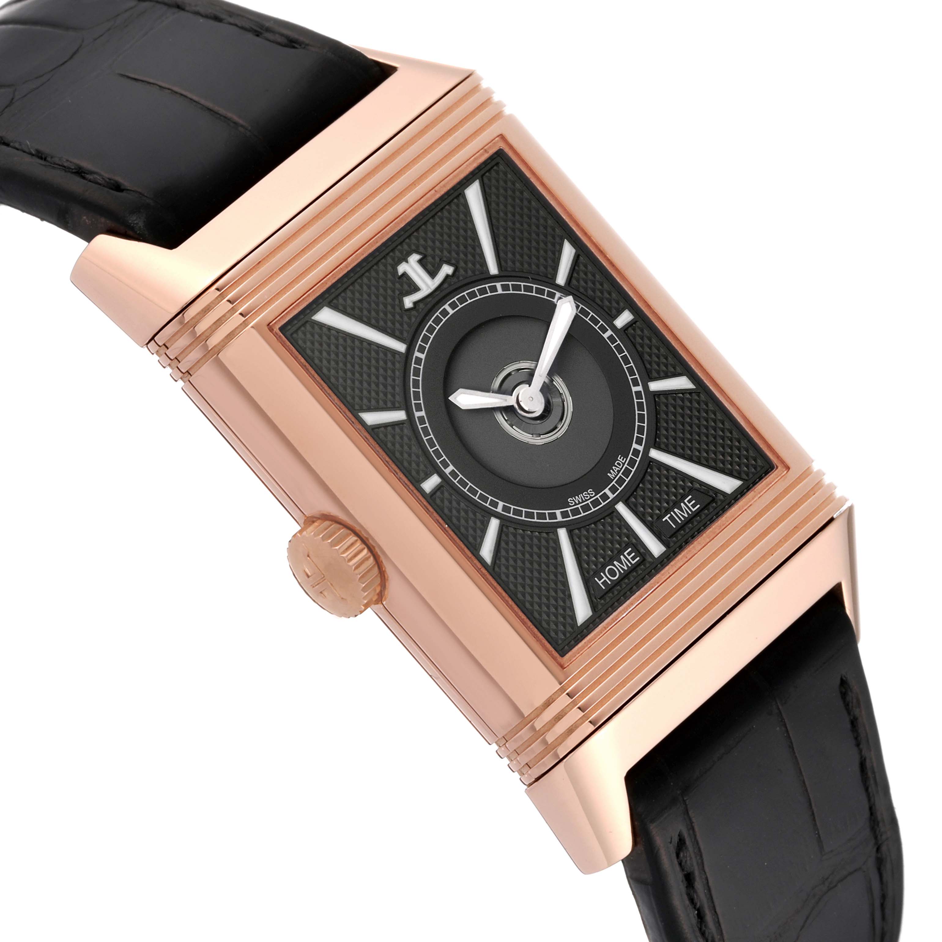 The image shows a close-up side angle of a Jaeger LeCoultre Reverso Q3832420 Men's Rose Gold Silver Dial Q3832420 Men's Rose Gold Silver Dial watch, highlighting its rectangular face, crown, and black strap.