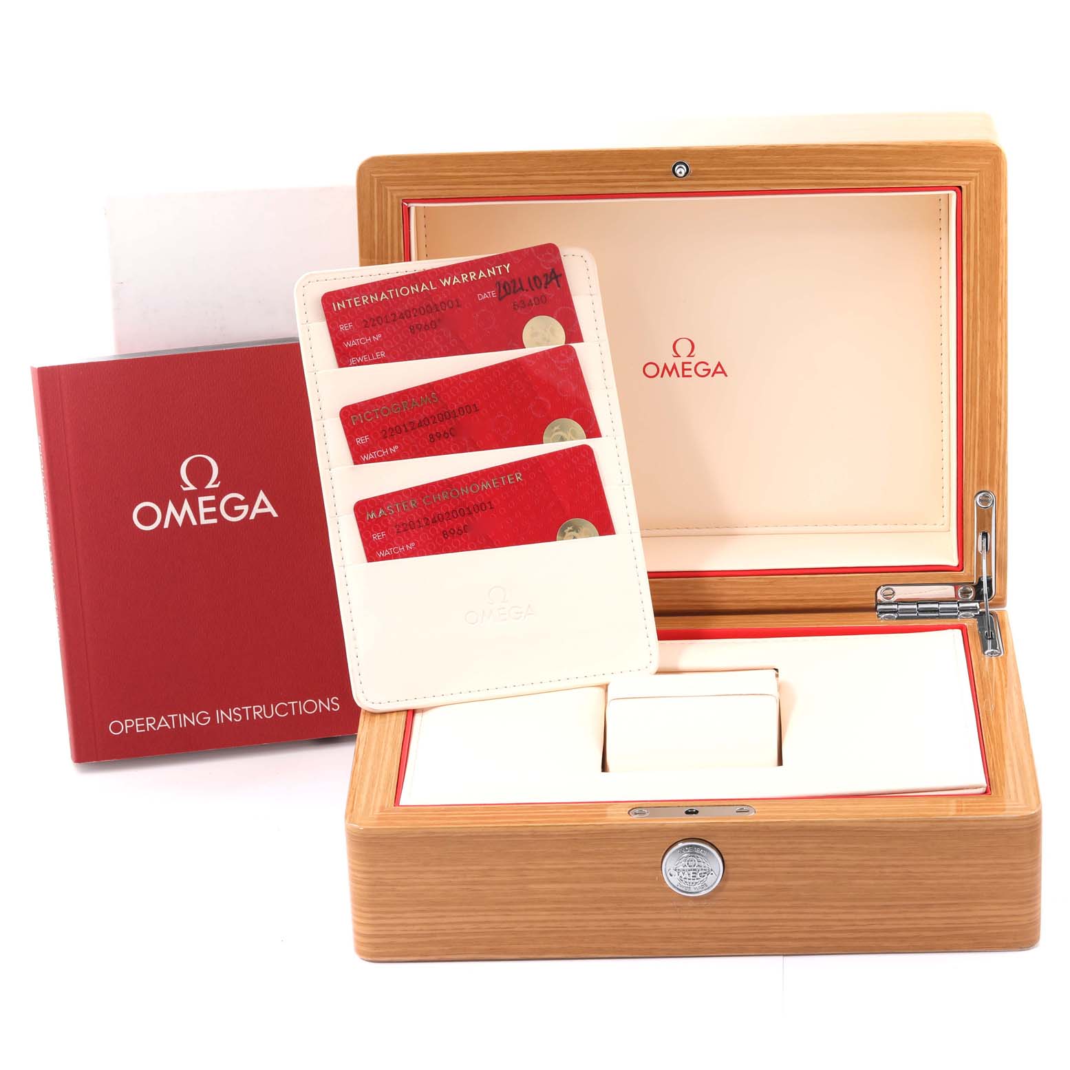 The image shows an Omega Seamaster 220.12.40.20.01.001 Men
s Stainless Steel Black Dial 220.12.40.20.01.001 Men
s Stainless Steel Black Dial watch box, warranty cards, and an operating instructions booklet.