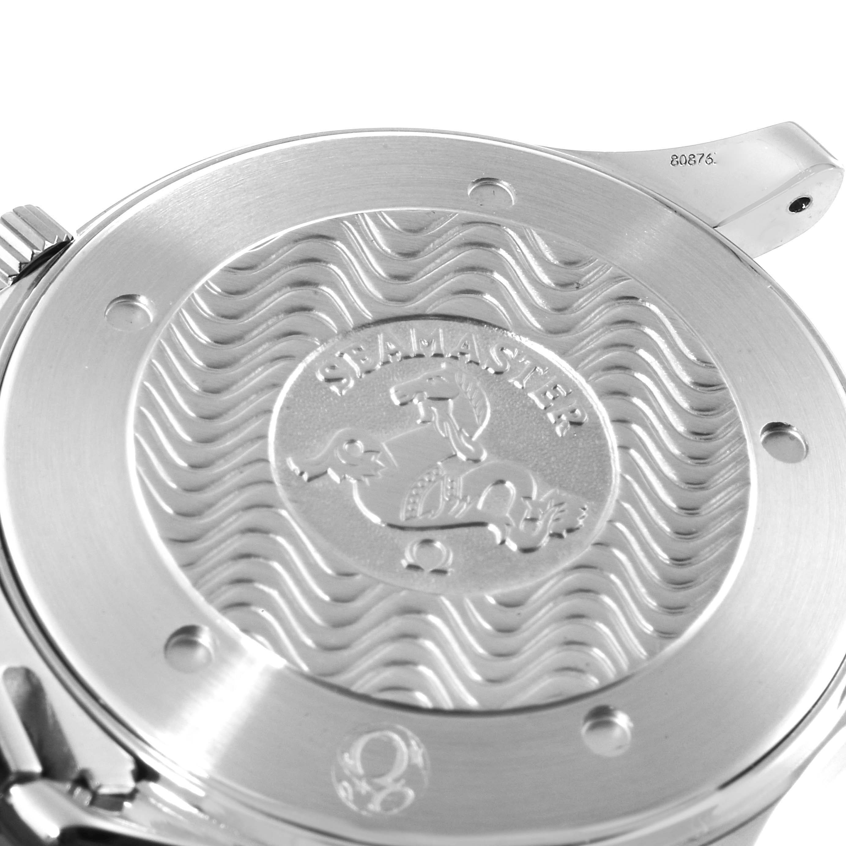 This image shows the back cover of an Omega Seamaster 2531.80.00 Men's Stainless Steel Blue Dial 2531.80.00 Men's Stainless Steel Blue Dial watch with the wavy design and logo engraving.