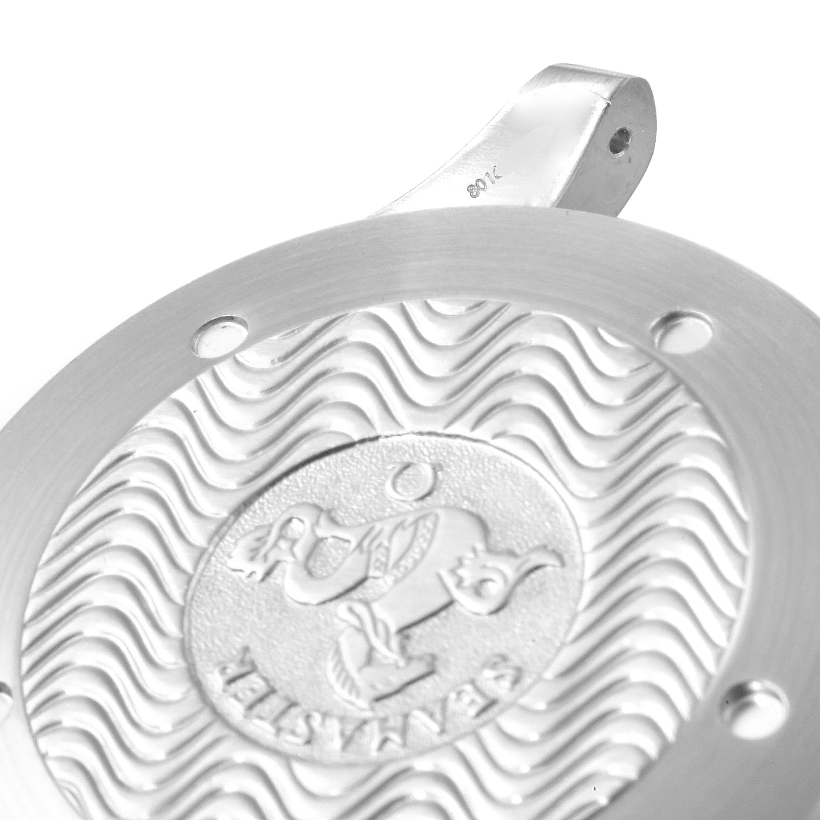 The image shows a close-up of the case back of an Omega Seamaster 2538.20.00 Men's Stainless Steel White Dial 2538.20.00 Men's Stainless Steel White Dial watch, featuring its engraved design and wavy pattern.