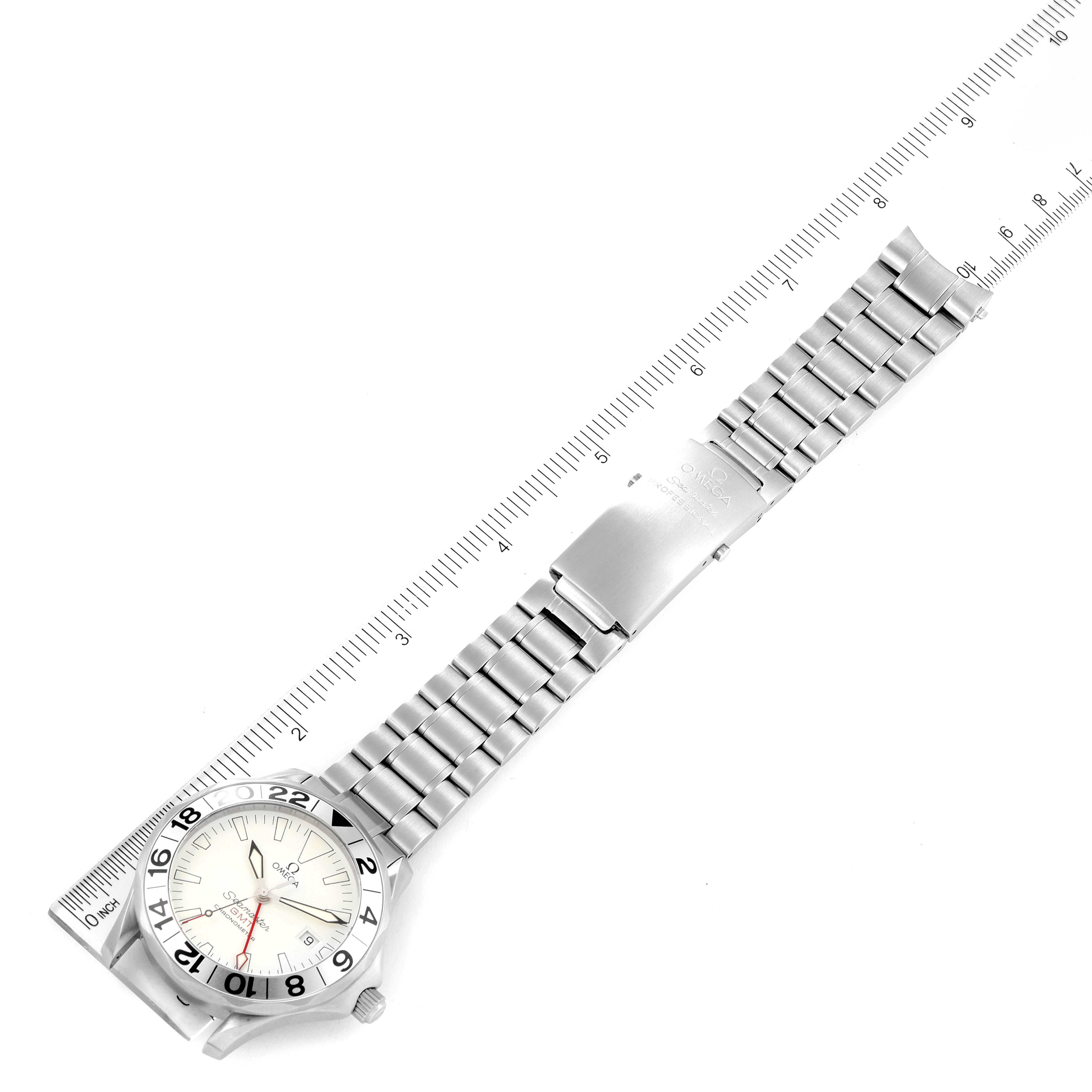 The image shows an Omega Seamaster 2538.20.00 Men's Stainless Steel White Dial 2538.20.00 Men's Stainless Steel White Dial watch placed flat with a metal bracelet and a ruler alongside for scale.