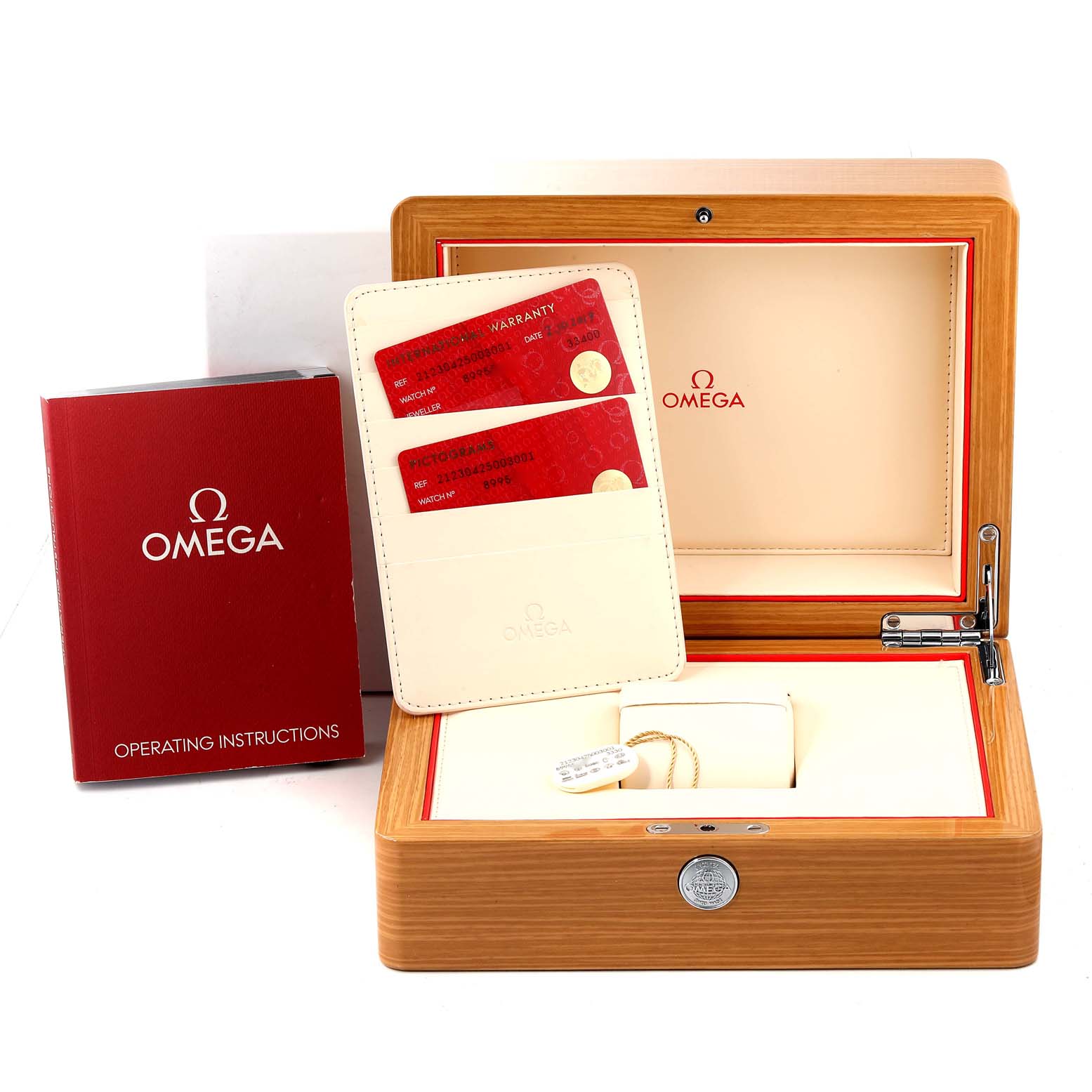 The image shows an Omega Seamaster 212.30.42.50.03.001 Men
s Stainless Steel Blue Dial 212.30.42.50.03.001 Men
s Stainless Steel Blue Dial watch box, warranty cards, and operating instructions at a front angle.