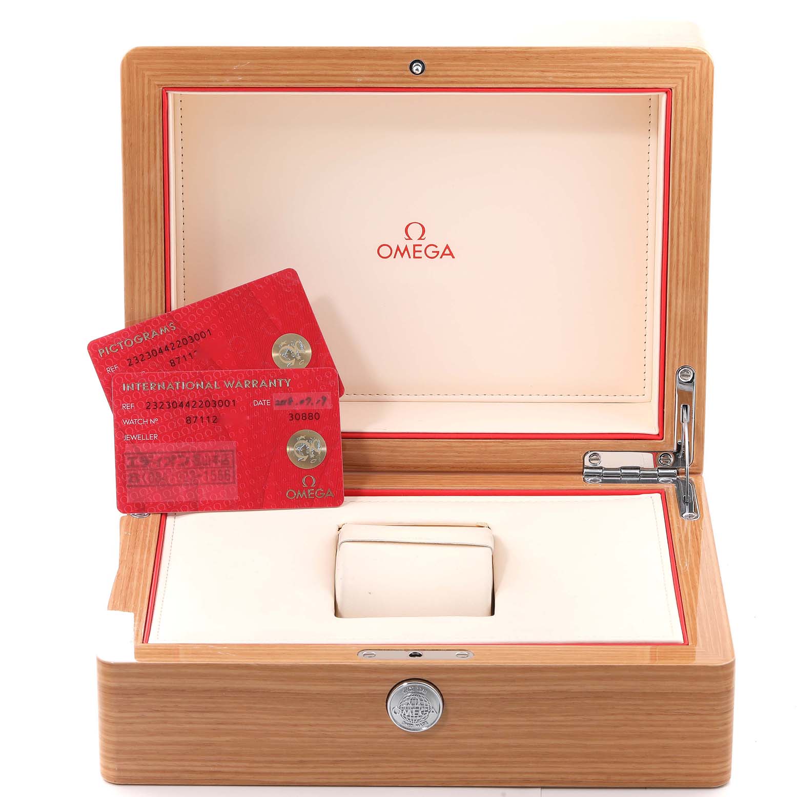 This image shows the open case and warranty cards for the Omega Planet Ocean 232.30.44.22.03.001 Men's Stainless Steel Blue Dial 232.30.44.22.03.001 Men's Stainless Steel Blue Dial watch.