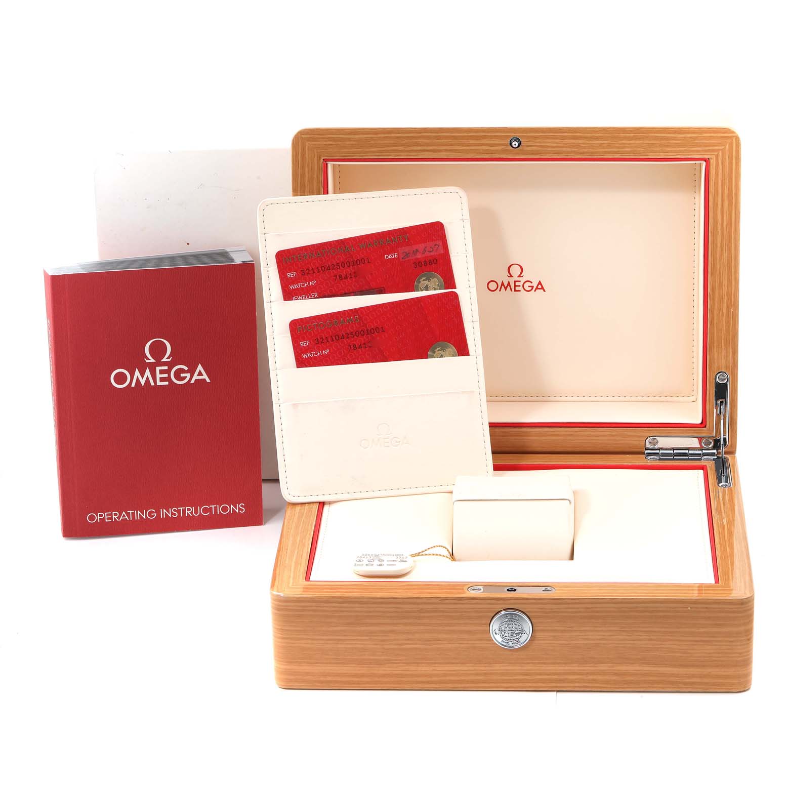 The image shows an Omega Speedmaster 321.10.42.50.01.001 Men
s Stainless Steel Black Dial 321.10.42.50.01.001 Men
s Stainless Steel Black Dial watch box, operating instructions, and warranty cards taken from a front angle.