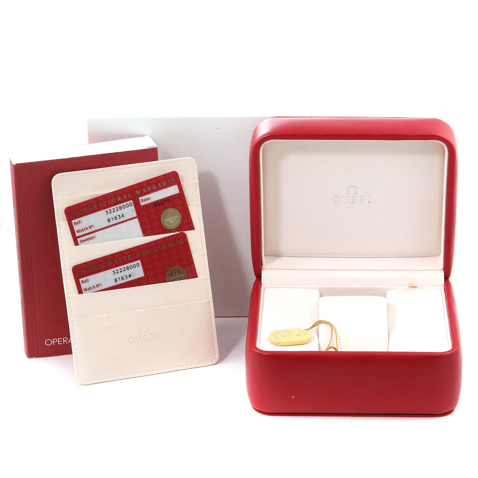 The image shows accessories for an Omega Speedmaster 3222.80.00 Men's Stainless Steel Blue Dial 3222.80.00 Men's Stainless Steel Blue Dial, including a red box, warranty cards, and a cardholder, viewed from above.