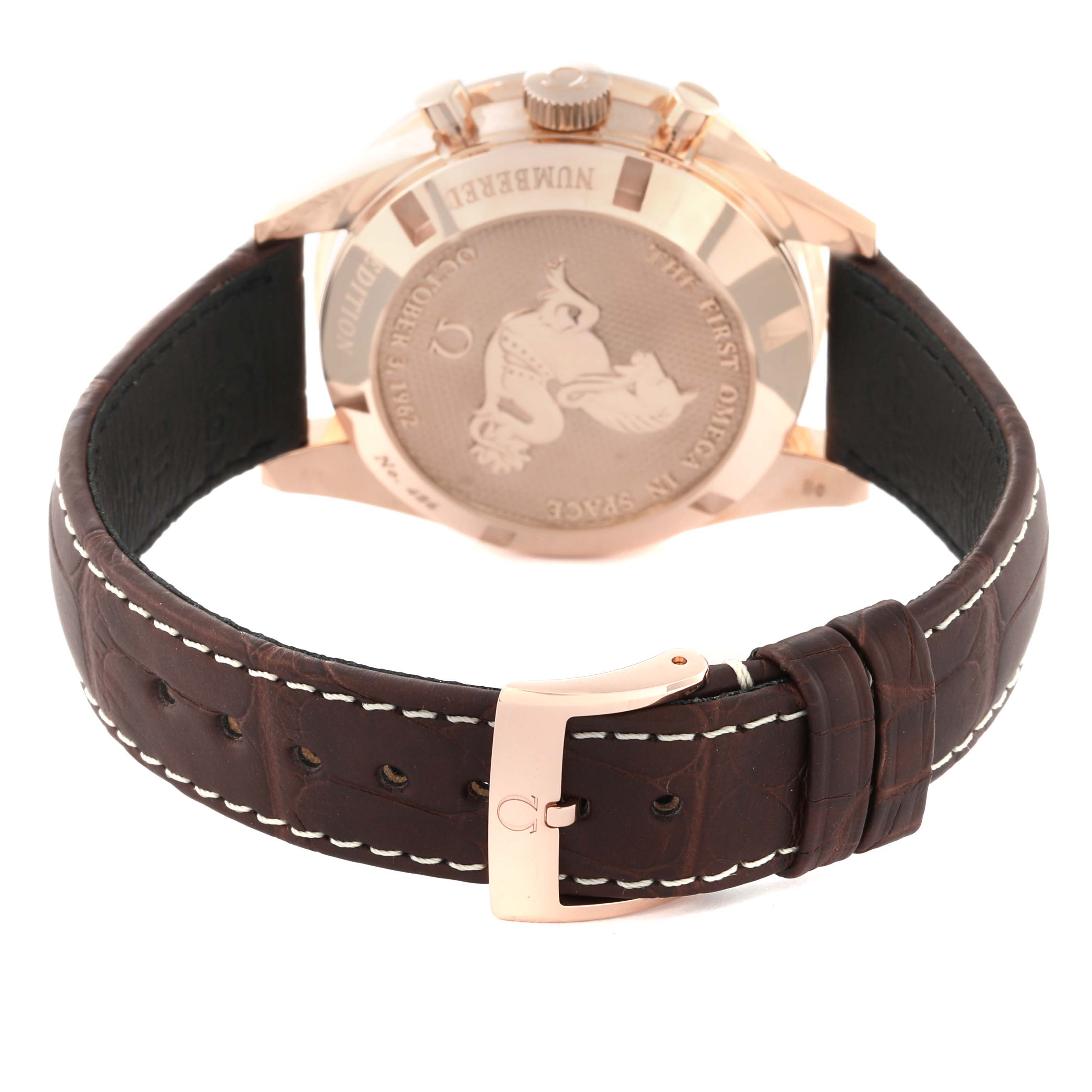 The image shows the back and strap of an Omega Speedmaster 311.63.40.30.02.001 Men's Rose Gold Silver Dial 311.63.40.30.02.001 Men's Rose Gold Silver Dial watch, highlighting its clasp and case back engravings.