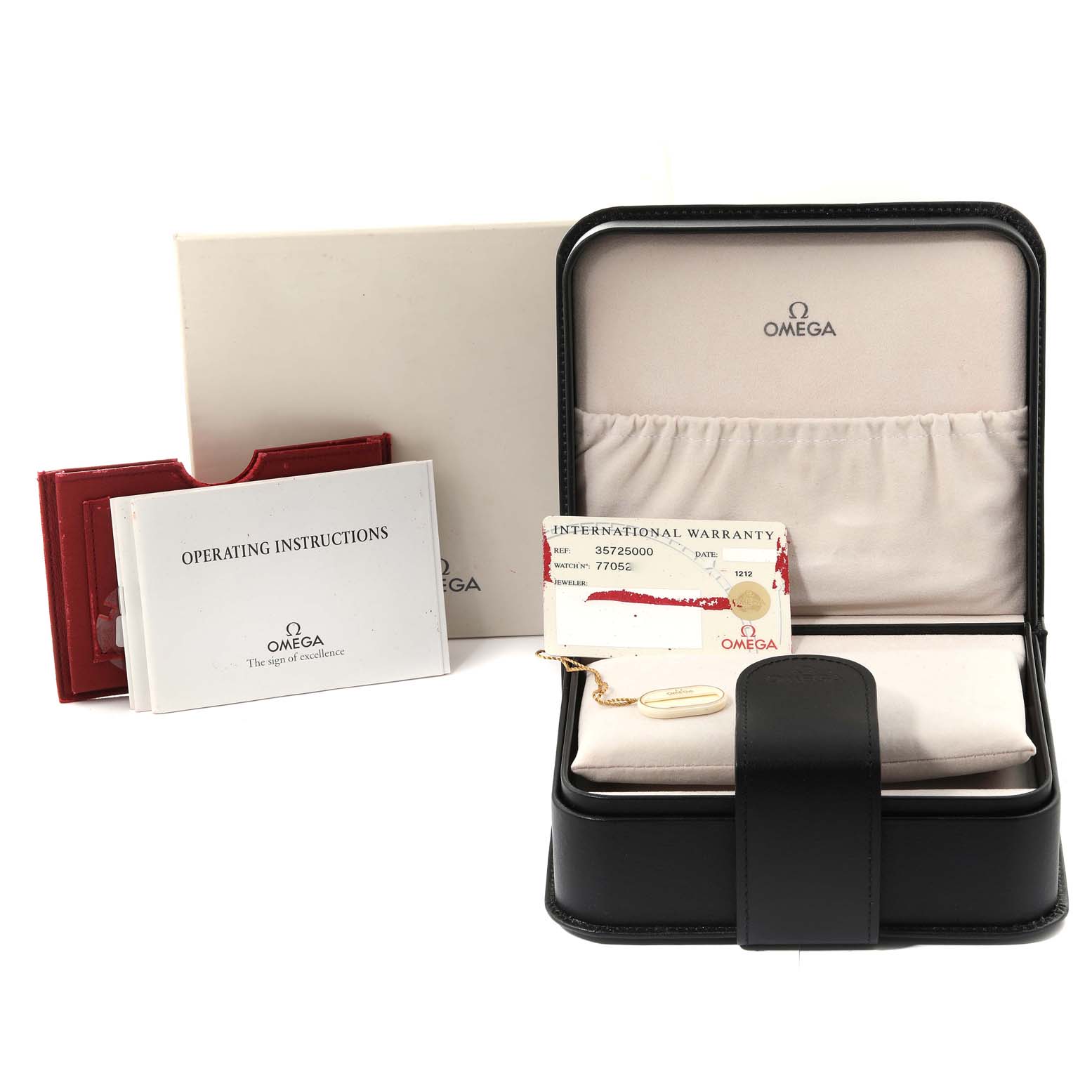 The image shows an Omega Speedmaster 3572.50.00 Men
s Stainless Steel Black Dial 3572.50.00 Men
s Stainless Steel Black Dial watch box, warranty card, operating instructions, and a tag.